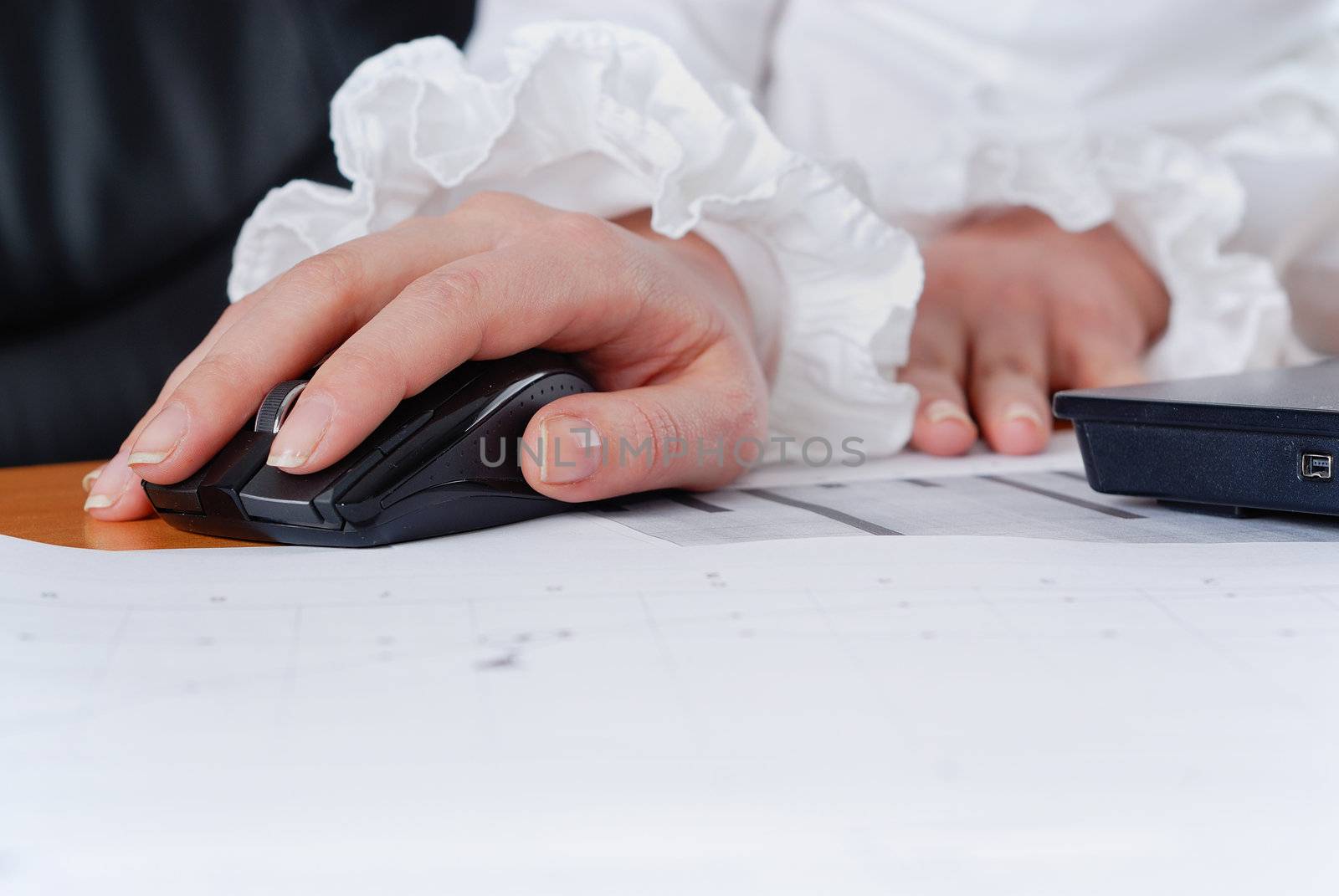 hands of a young girl working on laptop. Workplace businessman. 