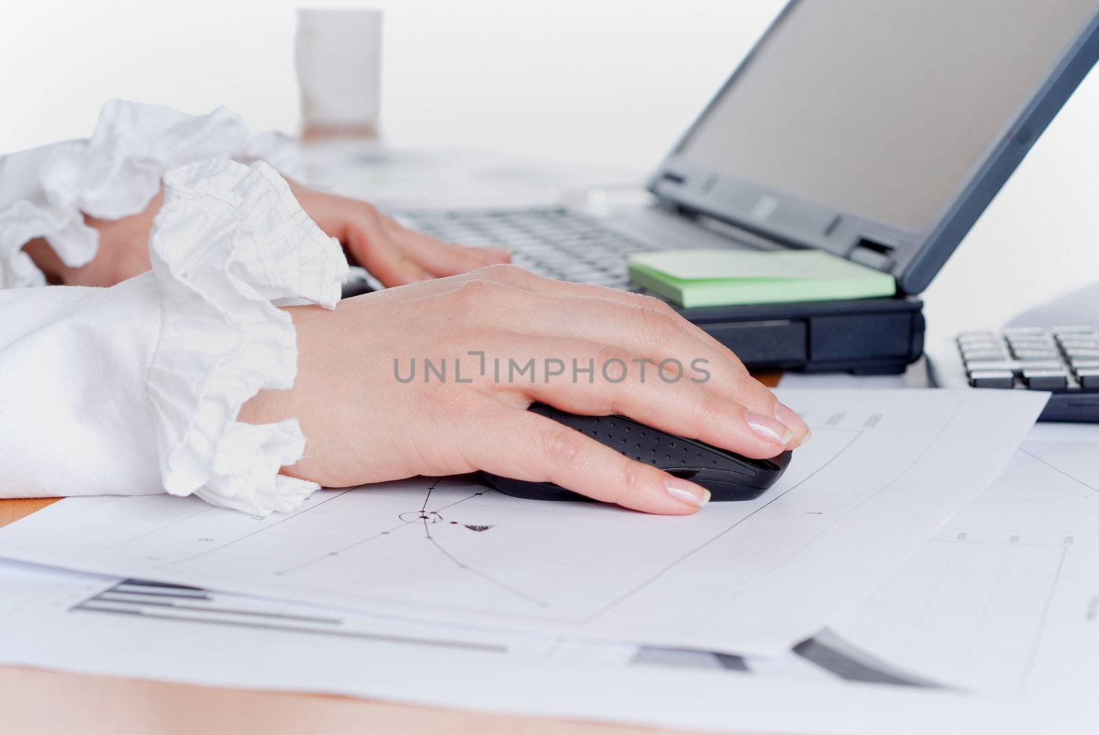 hands of a young girl working on laptop. Workplace businessman. 