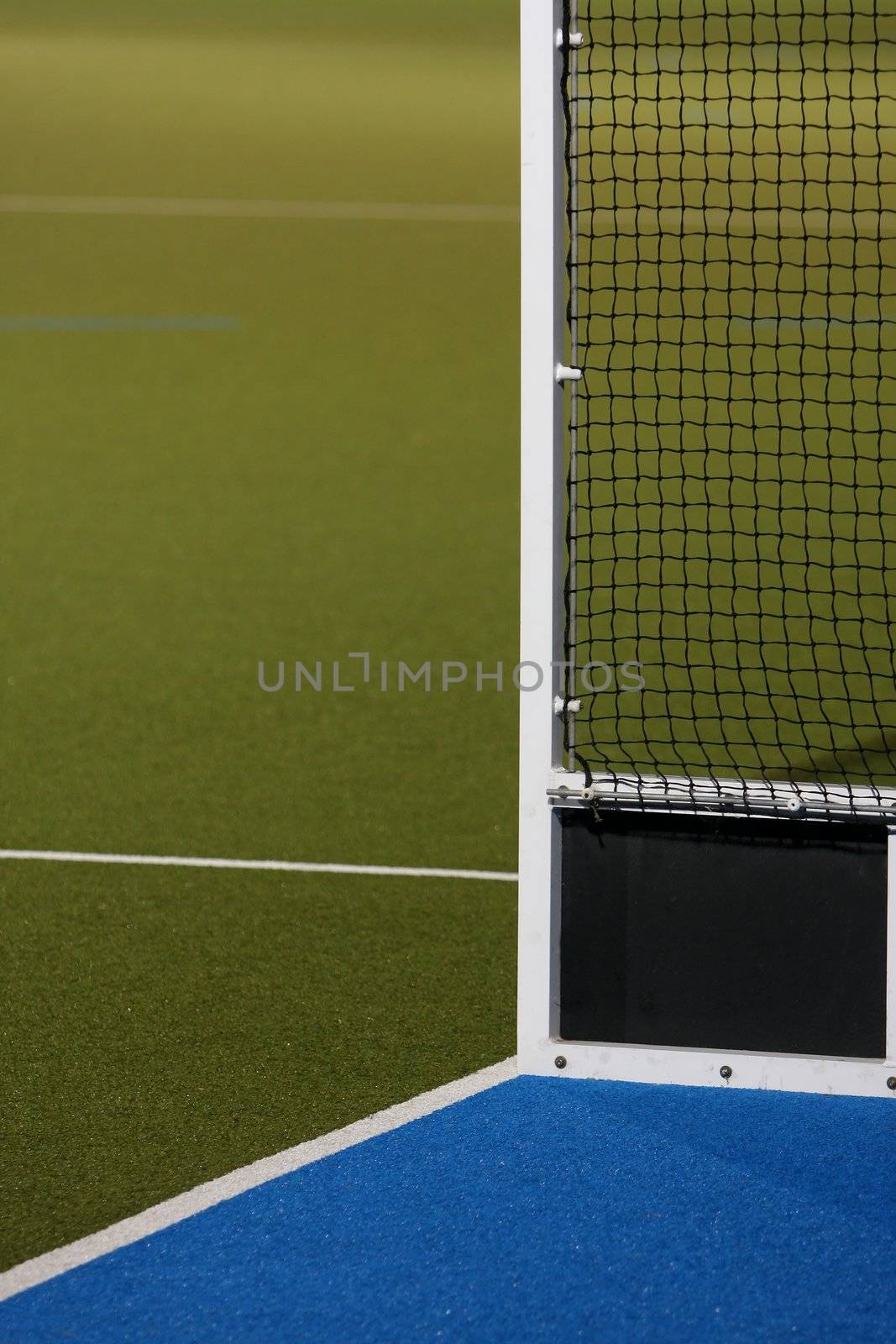 Abstract view of hockey goals on an Astroturf playing field