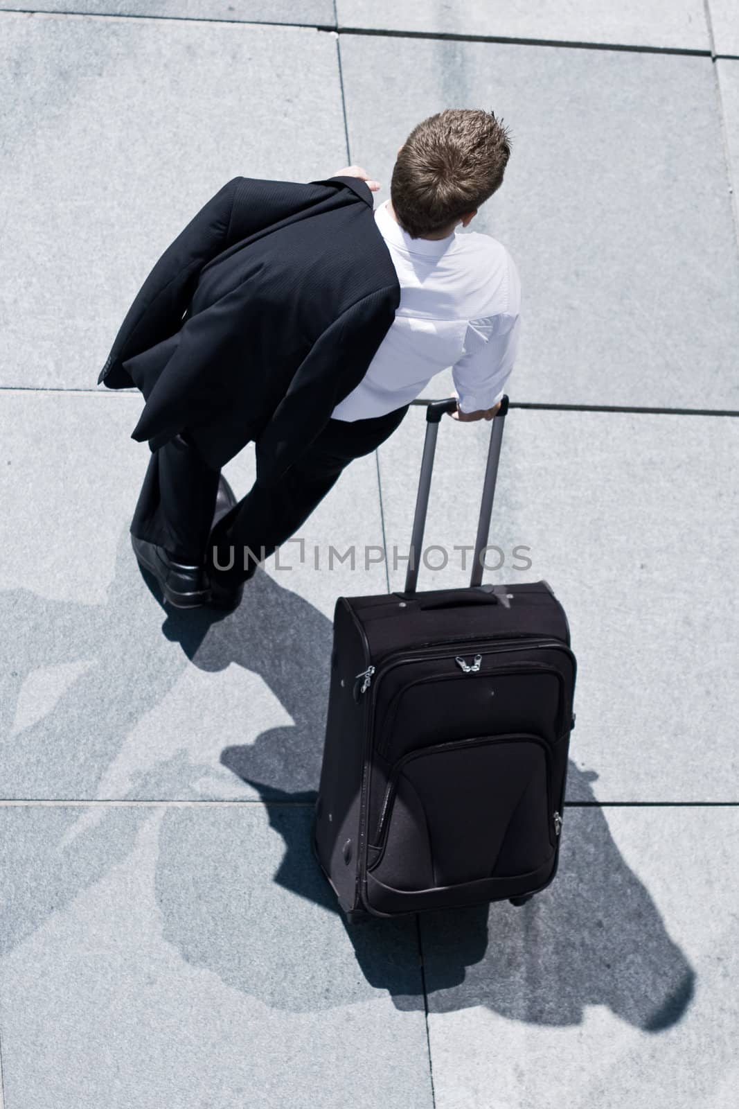 Corporate Man With Rolling Luggage by nfx702
