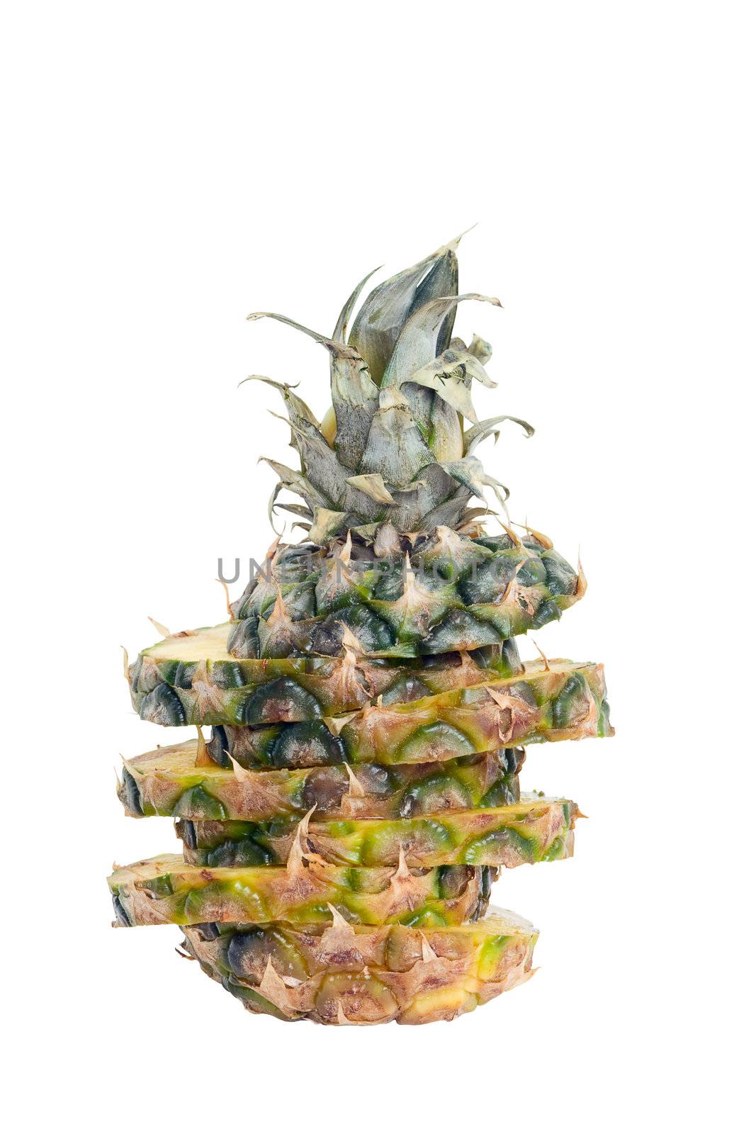 Pineapple, cut into slices, isolated on a white background.