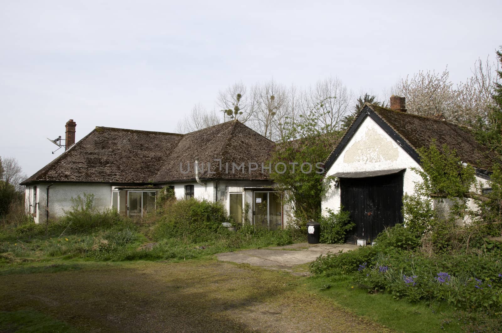 An old run-down and abandoned bungalow in the English countryside