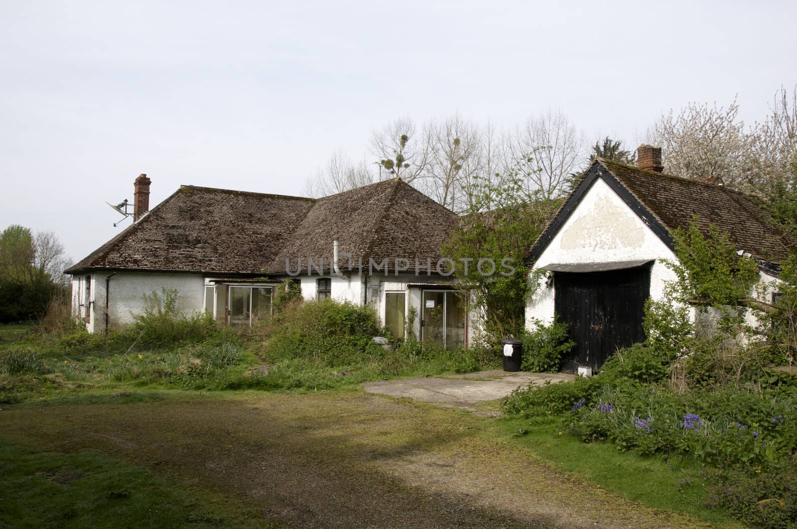 An old run-down and abandoned bungalow in the English countryside