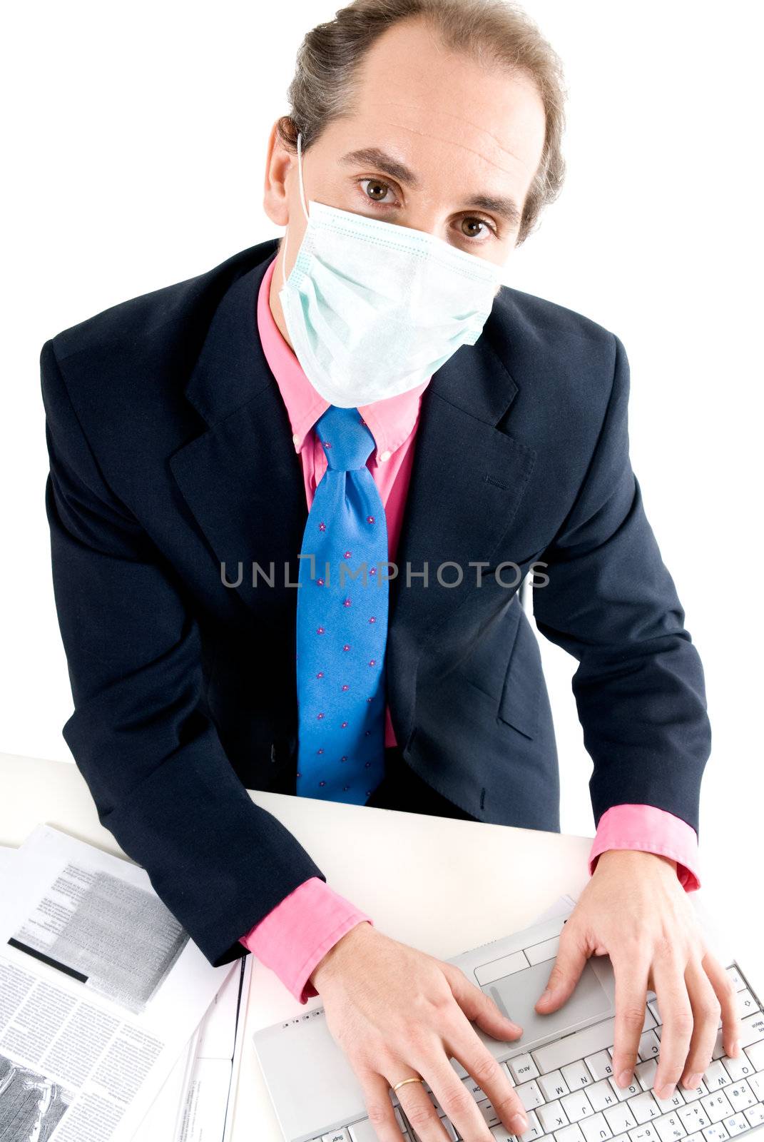 Businessman with medical mask for Flu prevention at work. 