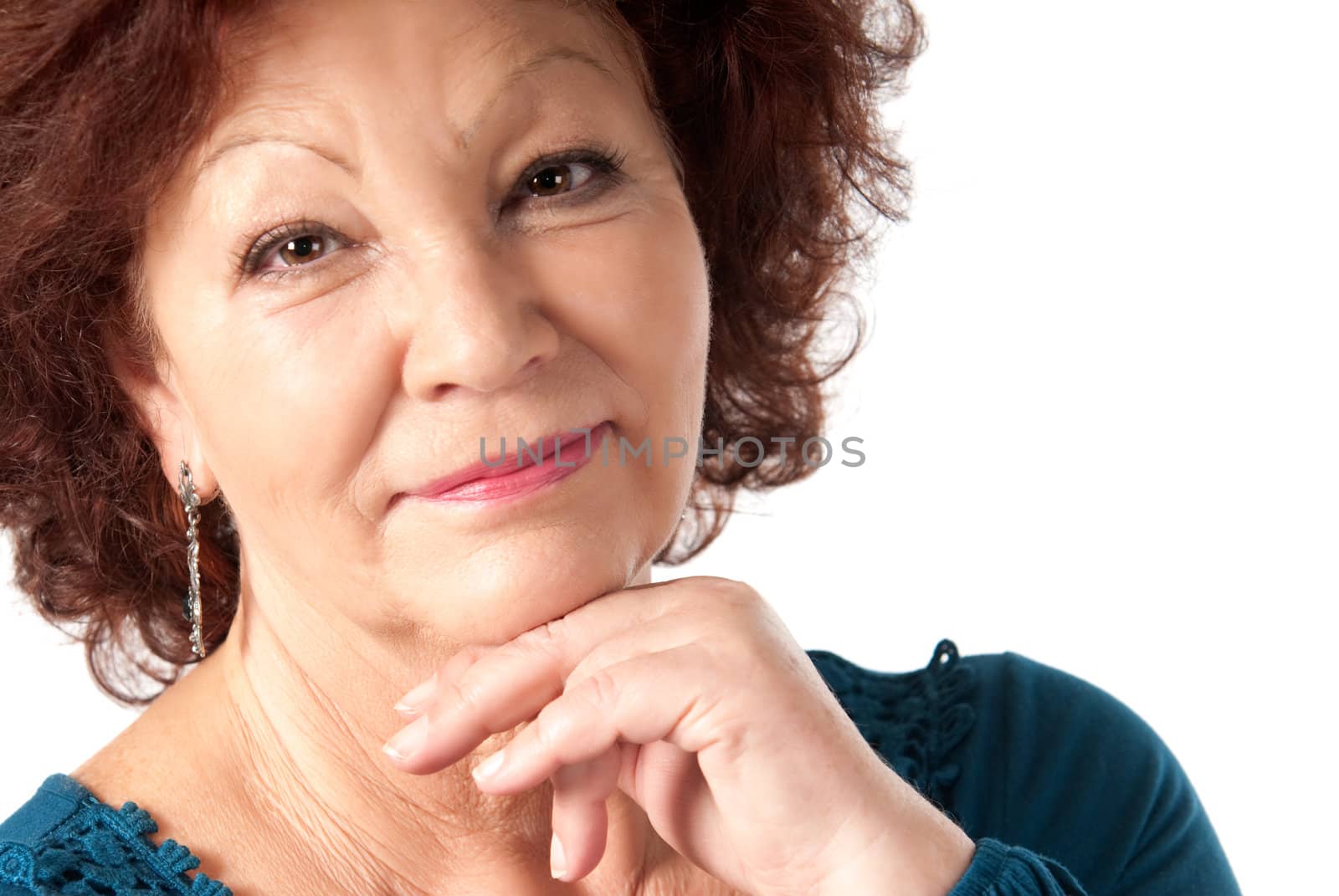 Senior female portrait on white background.