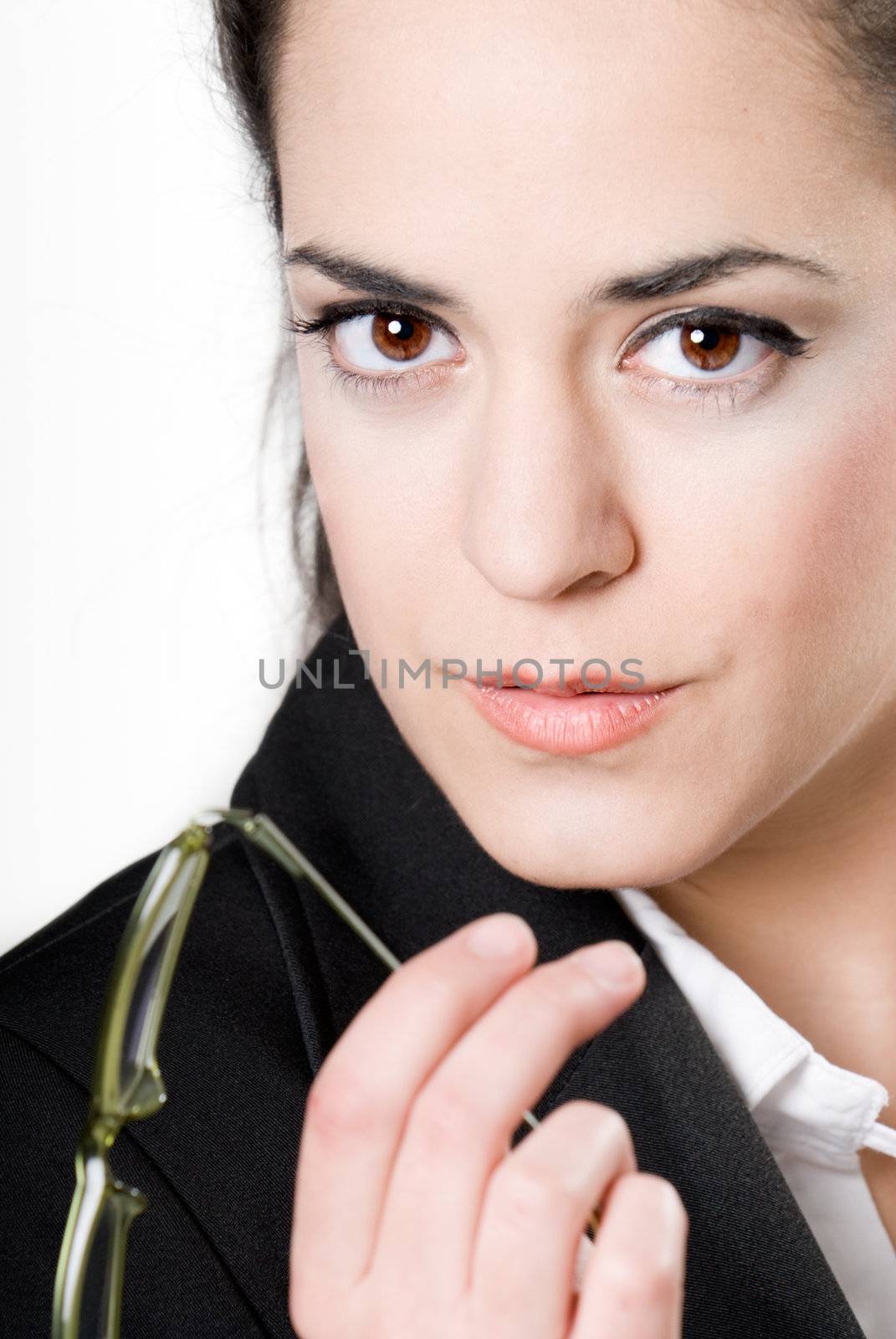 Young businesswoman with glasses on white background