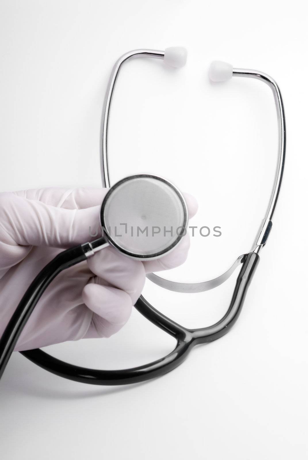 Stethoscope with medic hand by dgmata