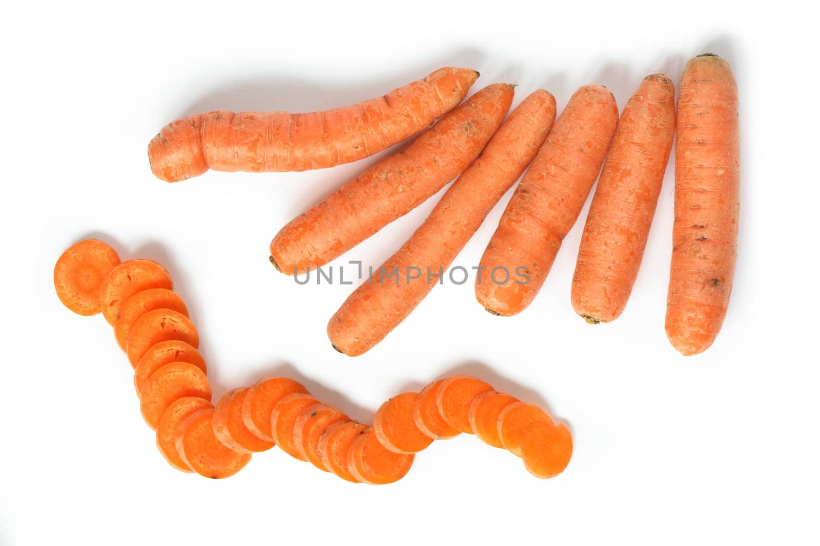 Few carrots and sliced carrot isolated on white background with clipping path