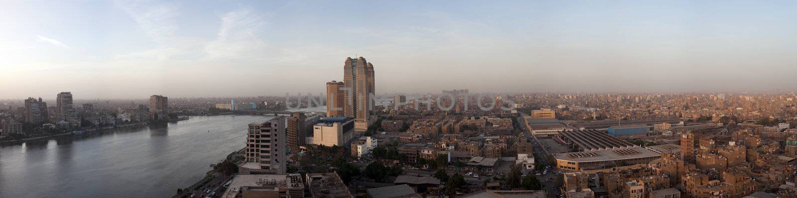 Smoggy evening panorama across Cairo in Egypt with the river Nile