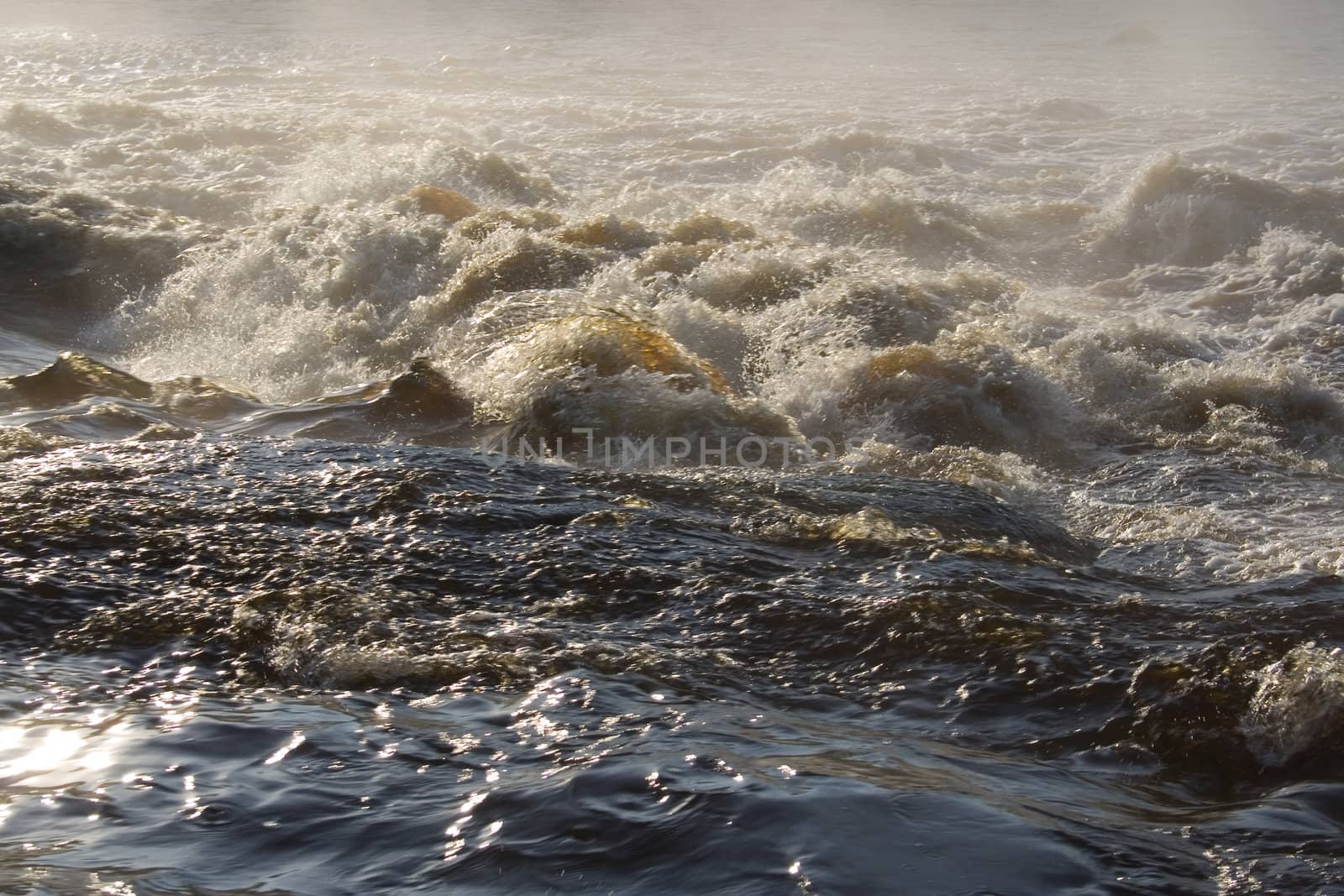 august foggy morning: river, foam; splashes
