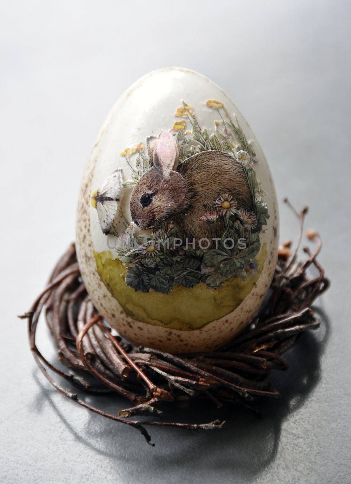 Hand crafted easter egg on willow weaved into a wreath..