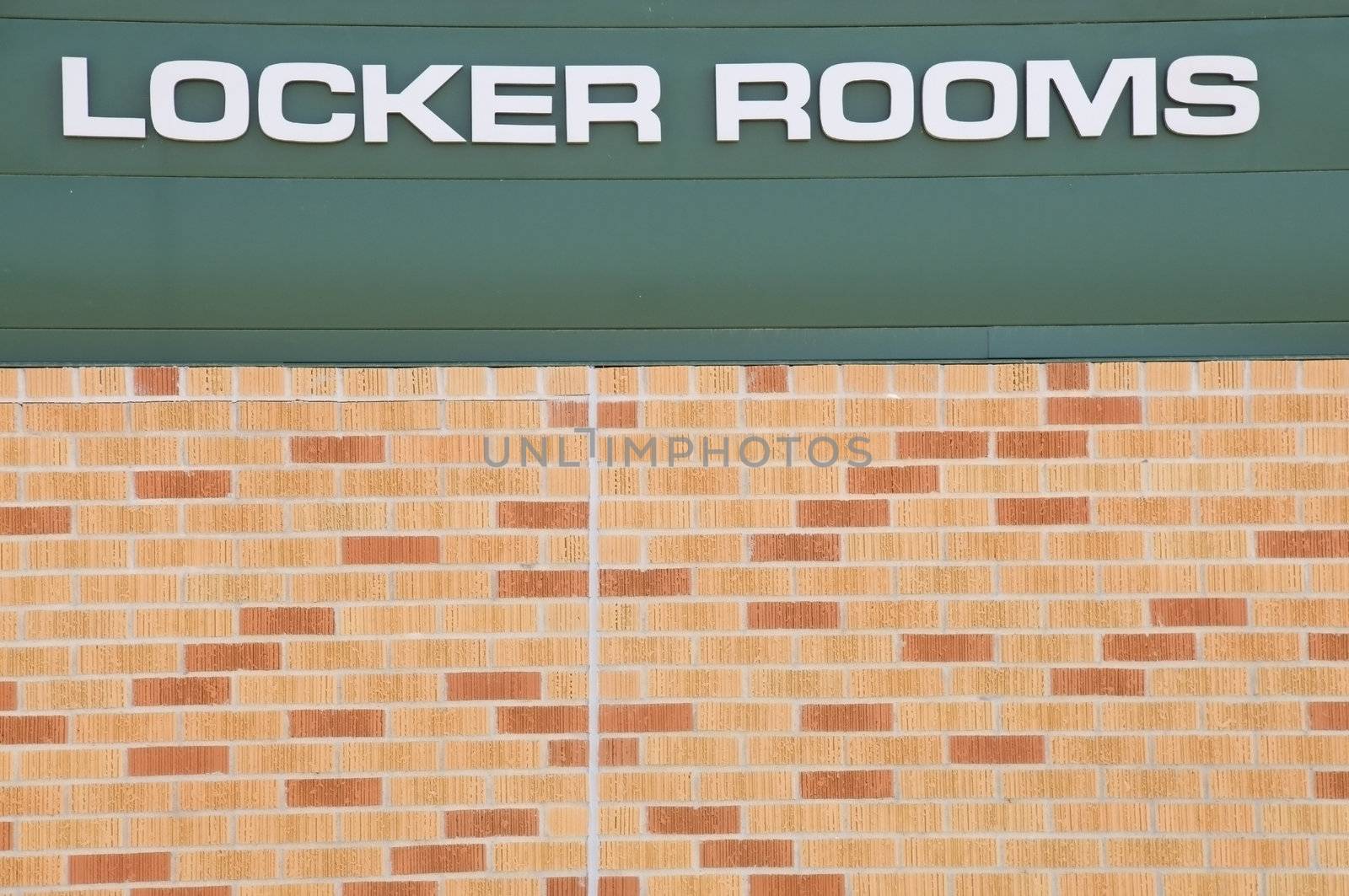 Locker Rooms sign at a football field