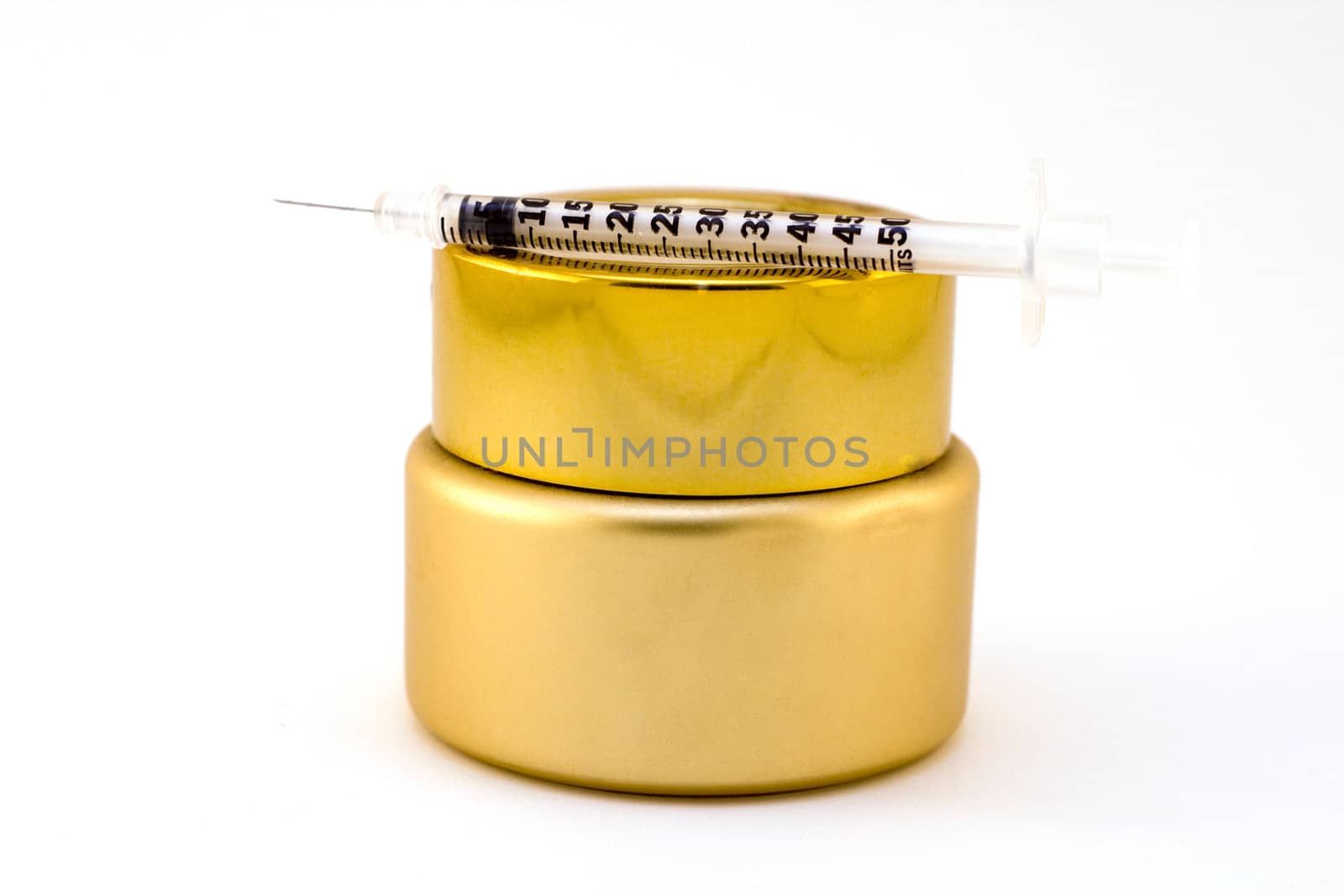 Beauty product with needle isolated on white background