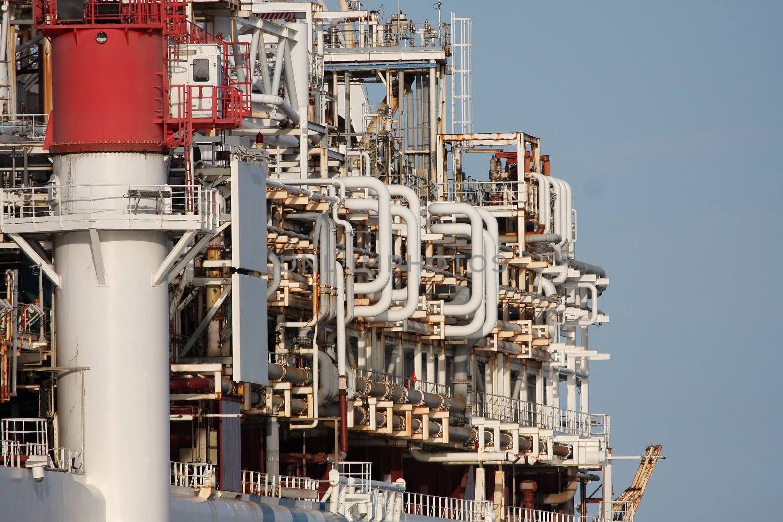 Intricate pipes and fittings of an oil production ship