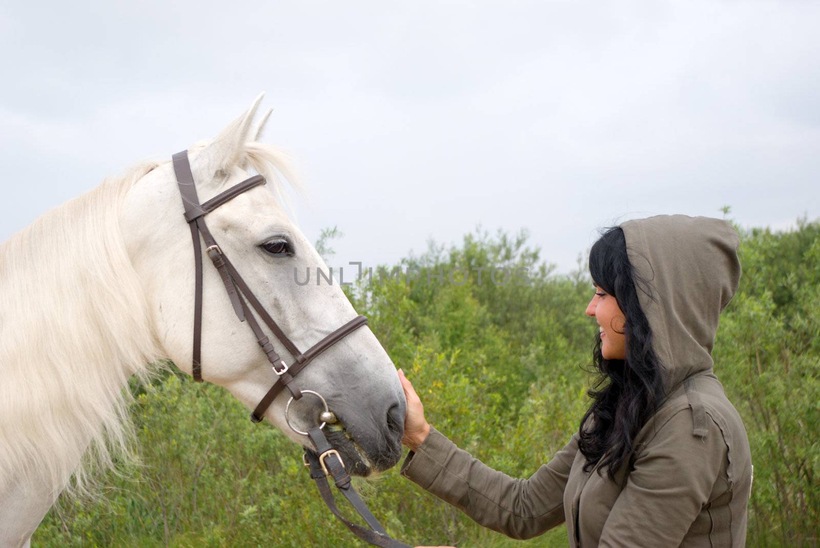 the romantic girl and horse.Contact with nature