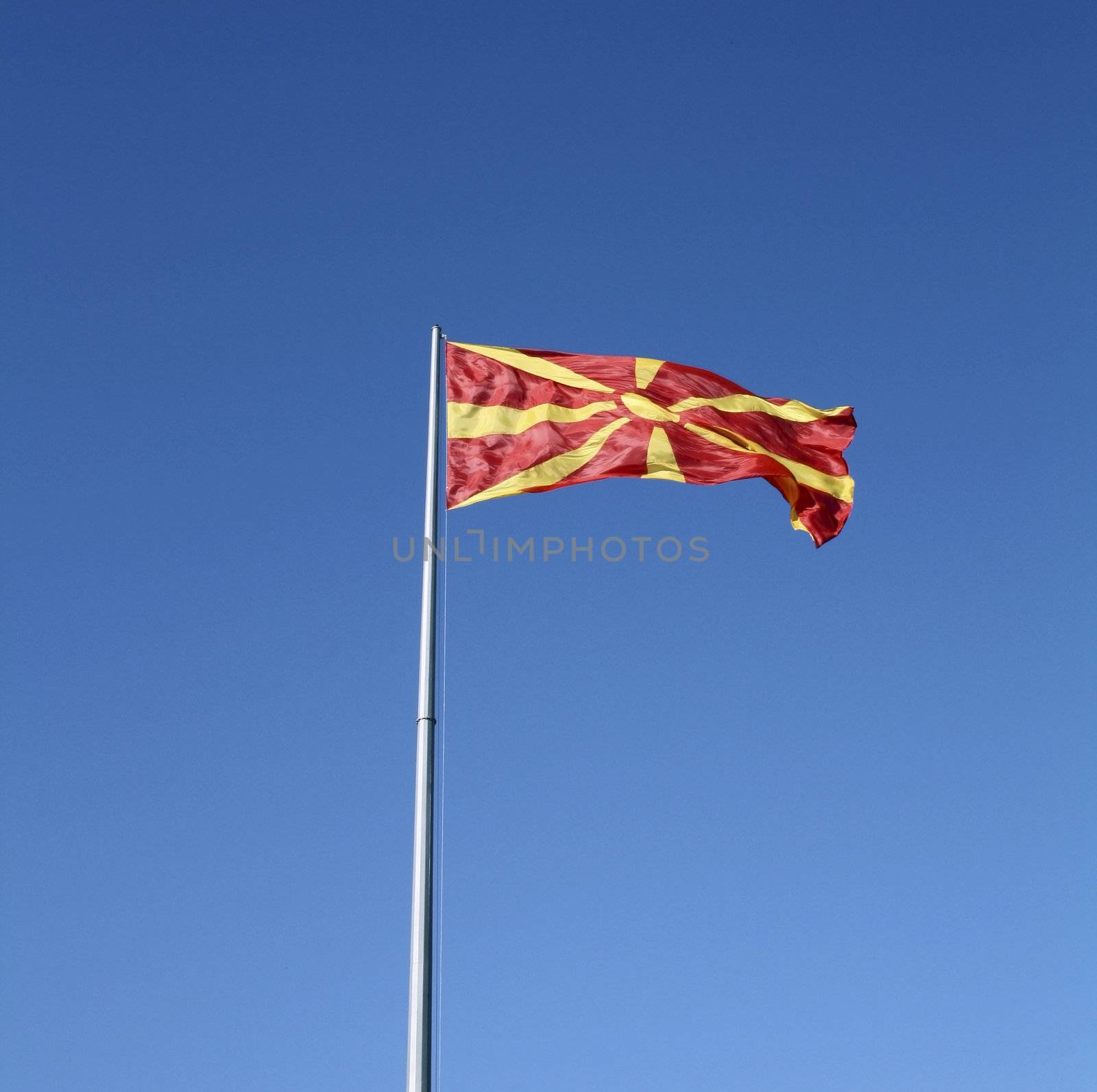 The National Flag of the Republic of Macedonia on mast