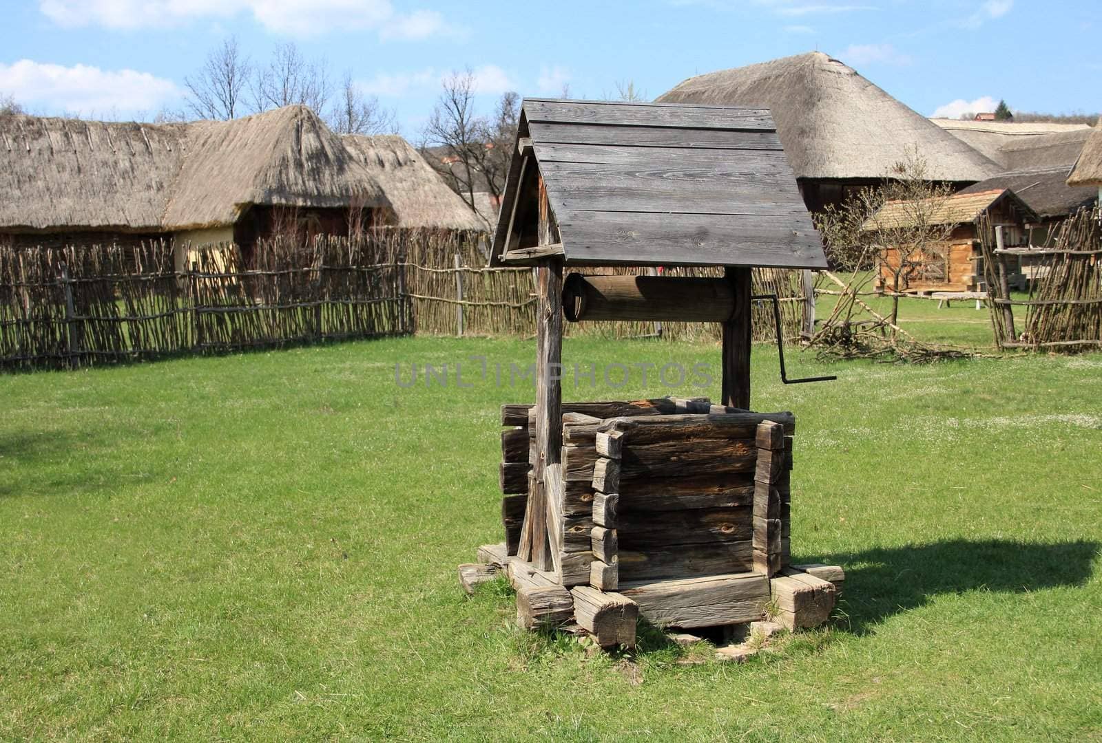 Wheeled wells in the village yard.