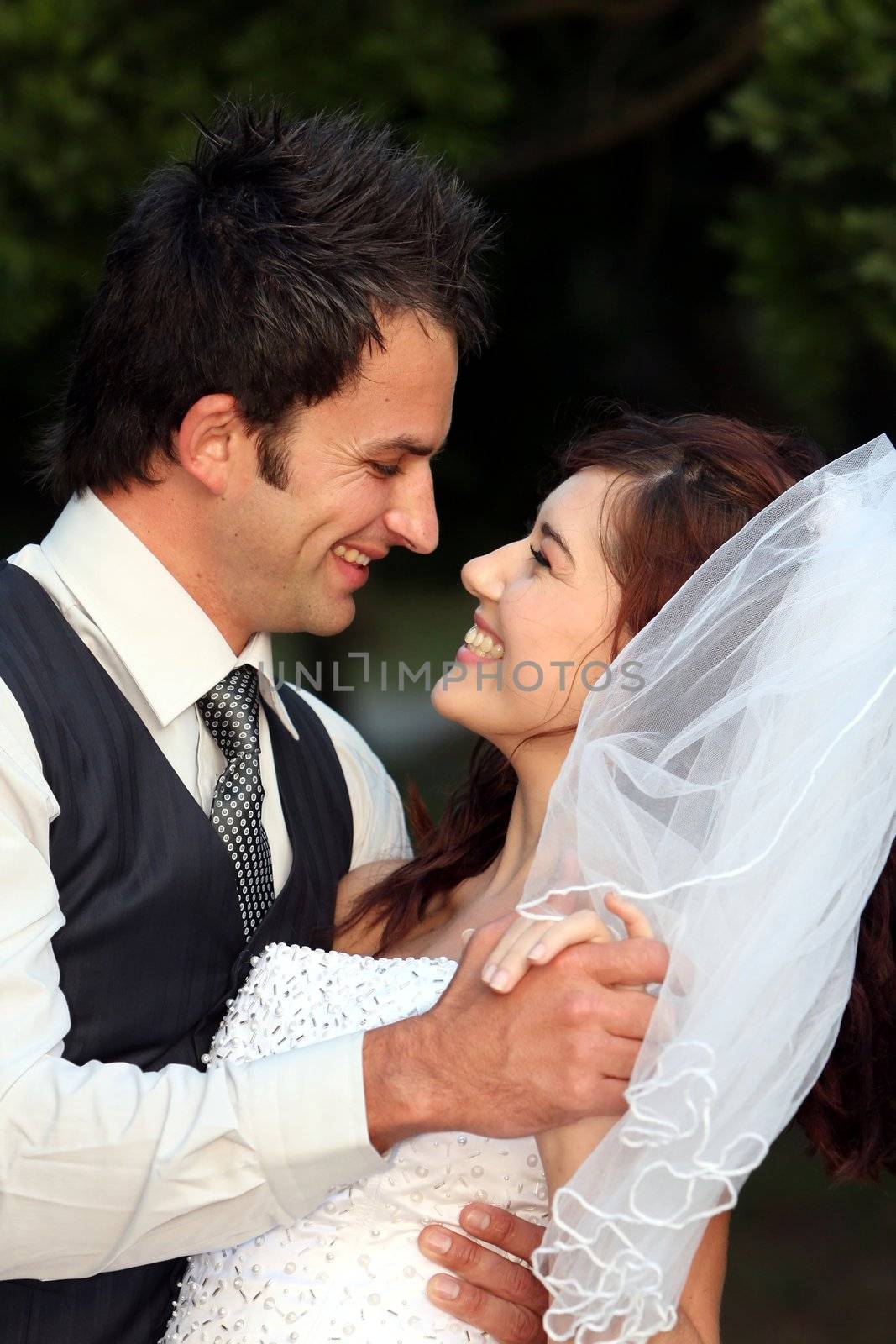 Joyful marriage couple dancing on their wedding day