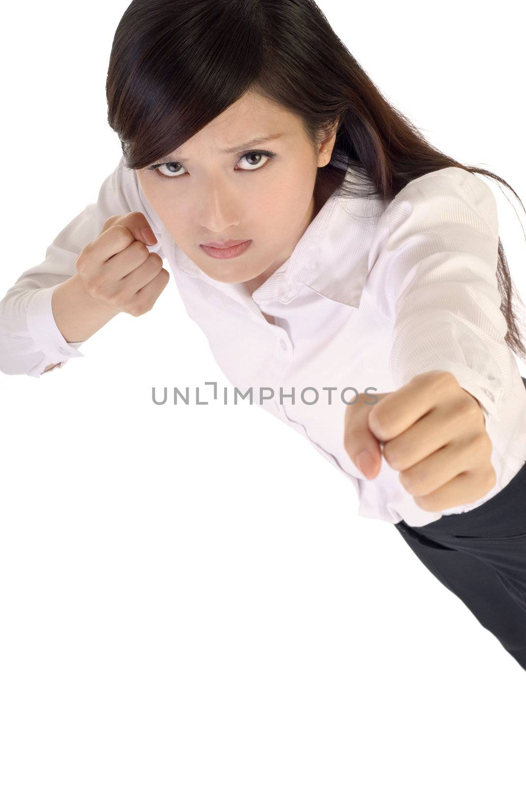 Business woman fighting pose on white background.