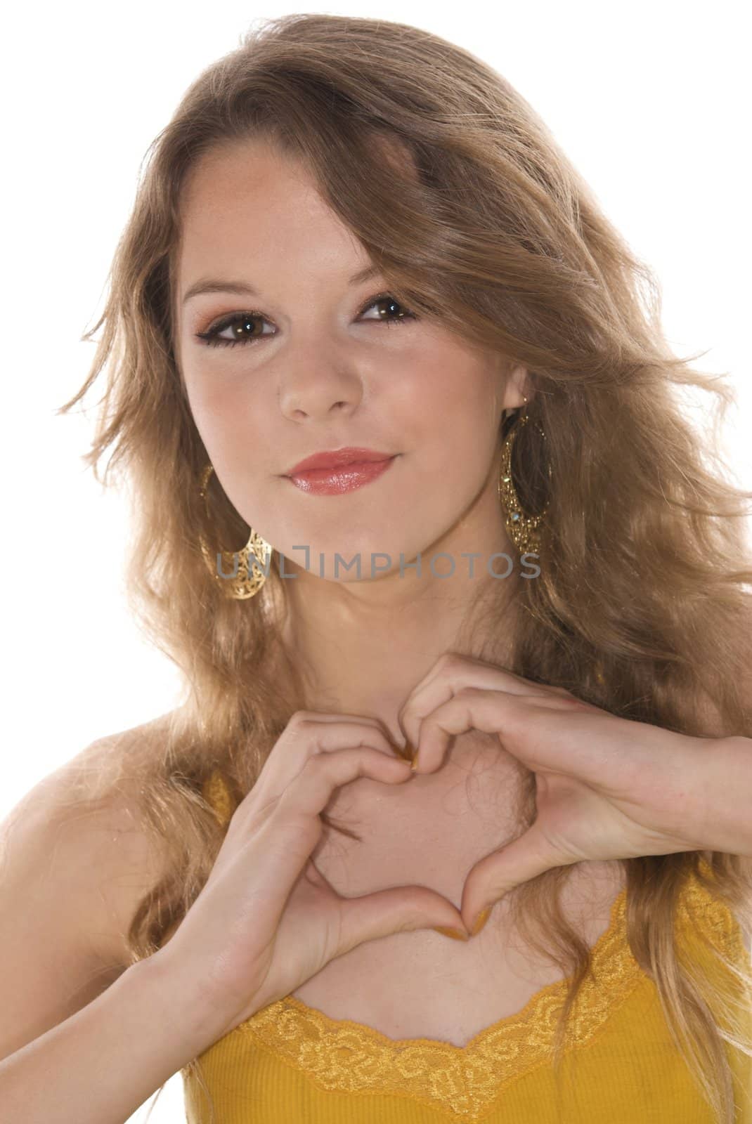 Beautiful Teenager with Hands in Heart Shape by pixelsnap