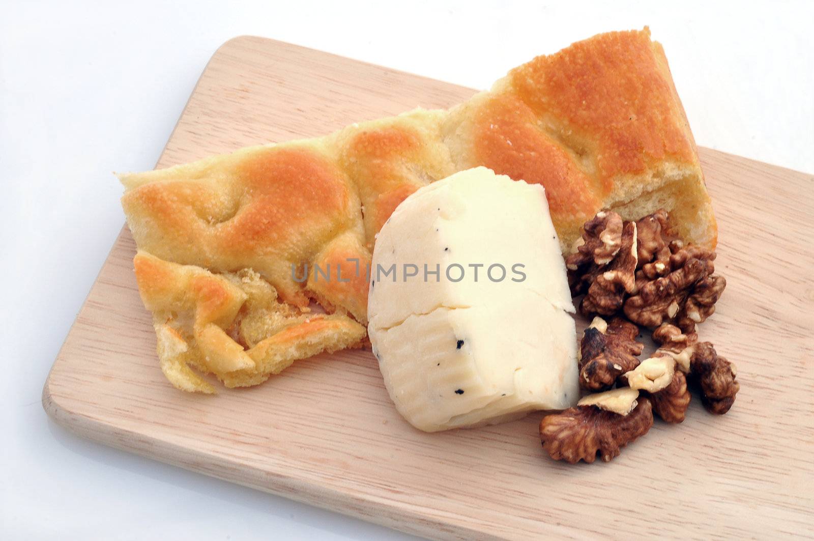 Focaccia, cheese and nuts on white background