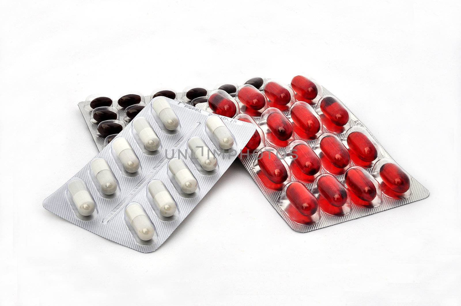 Blisters different pills on a white background