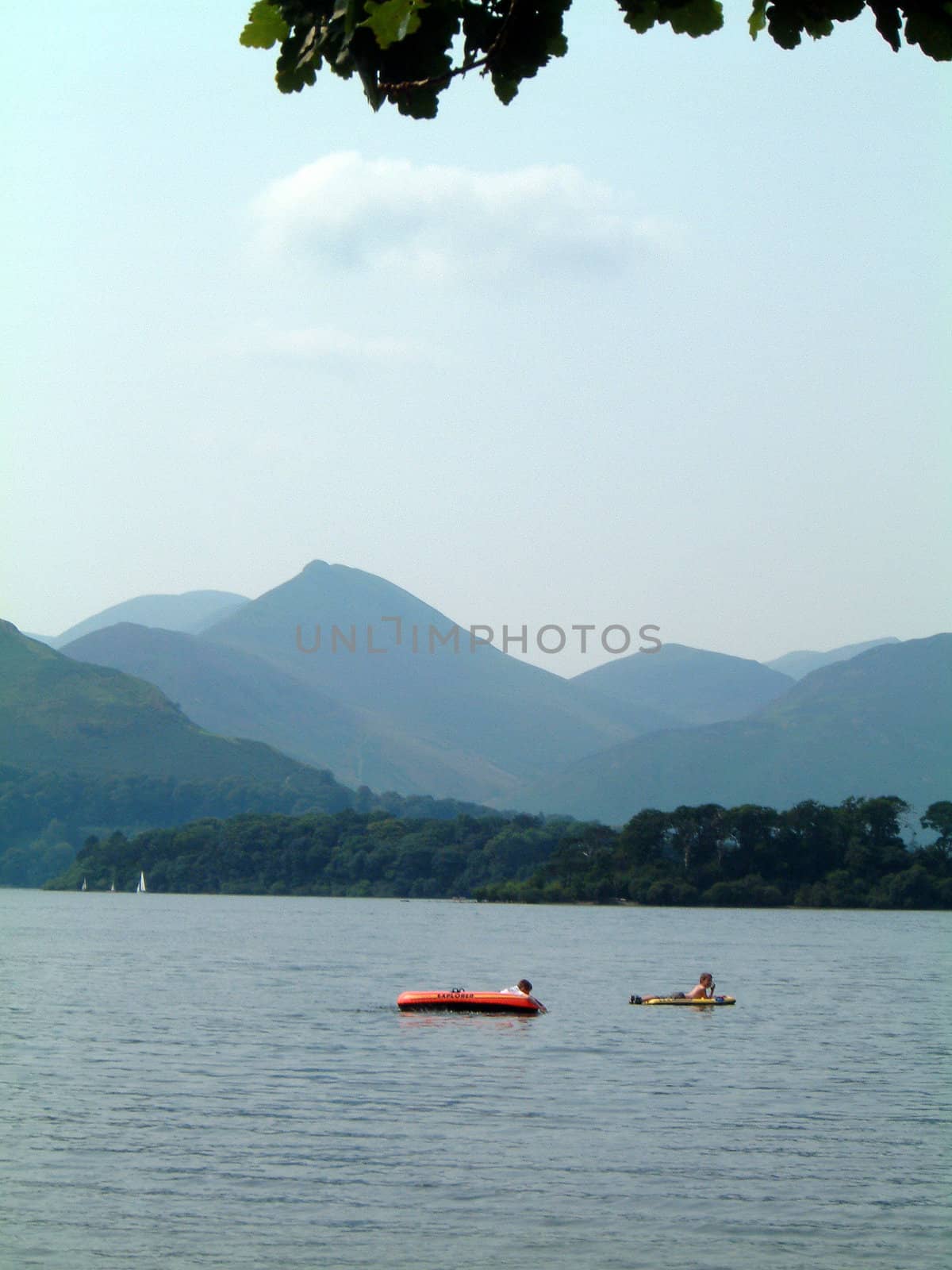 children playing in boats on Derwent water