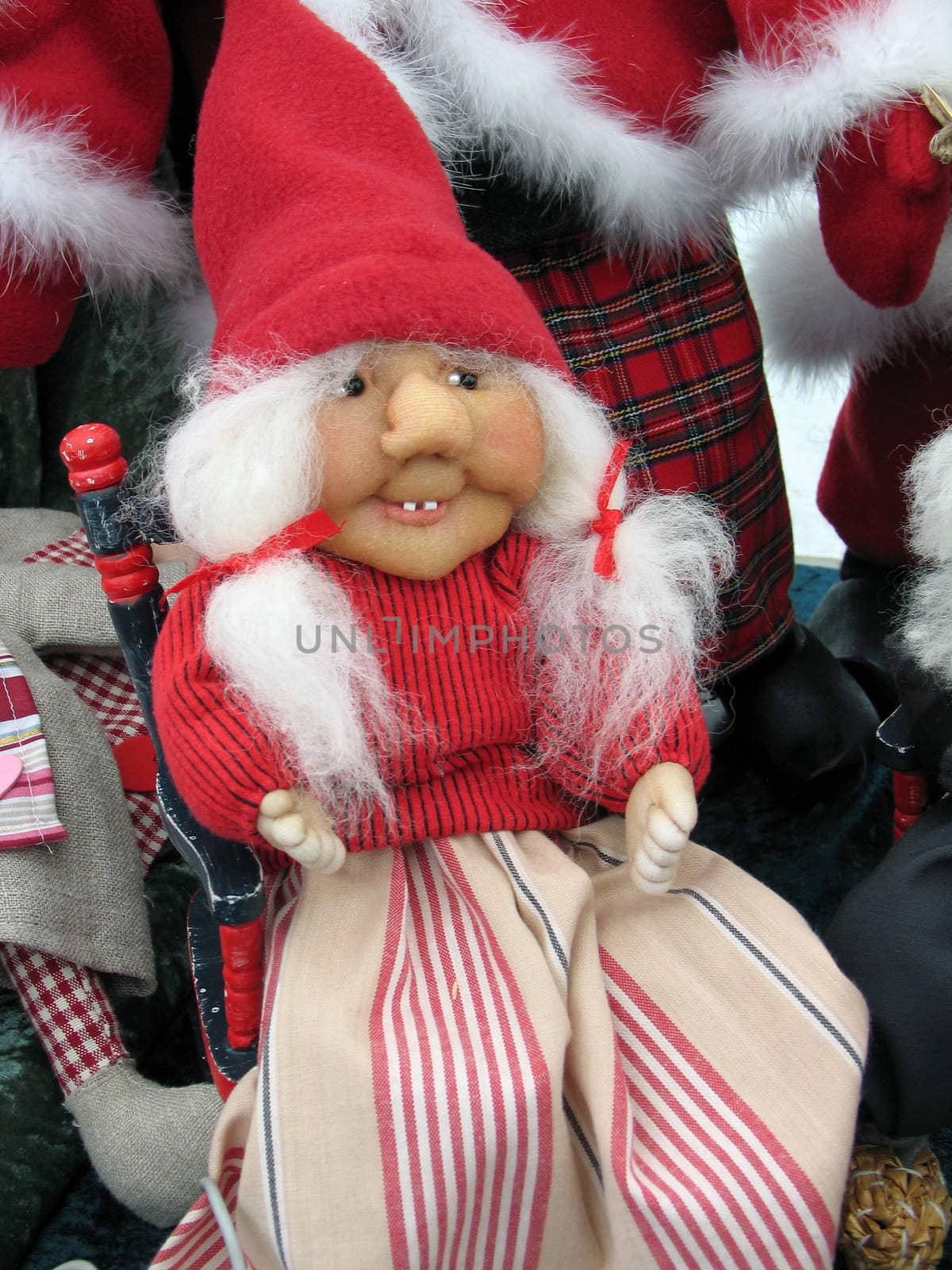 Christmas doll figurine of cute smiling grandmother