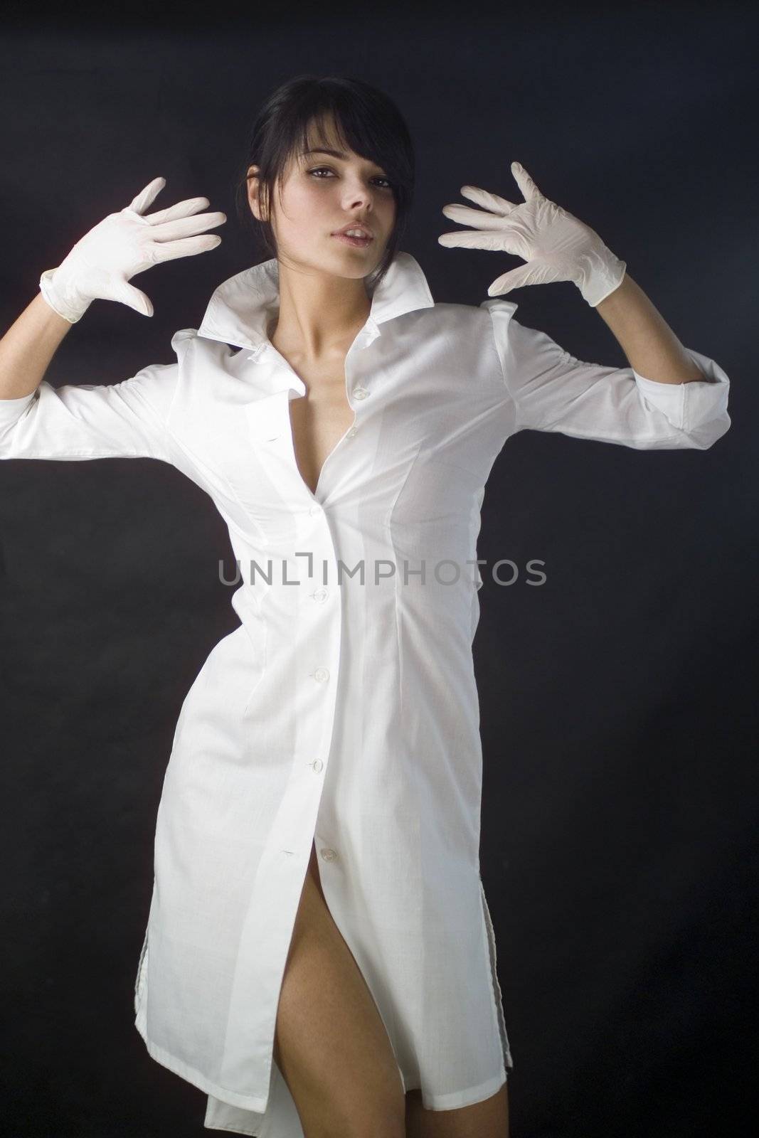 dentist doctor a woman in a white apron with the tool