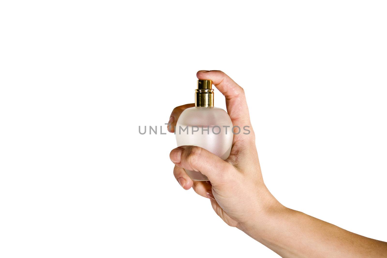 Female hand with perfume on white background