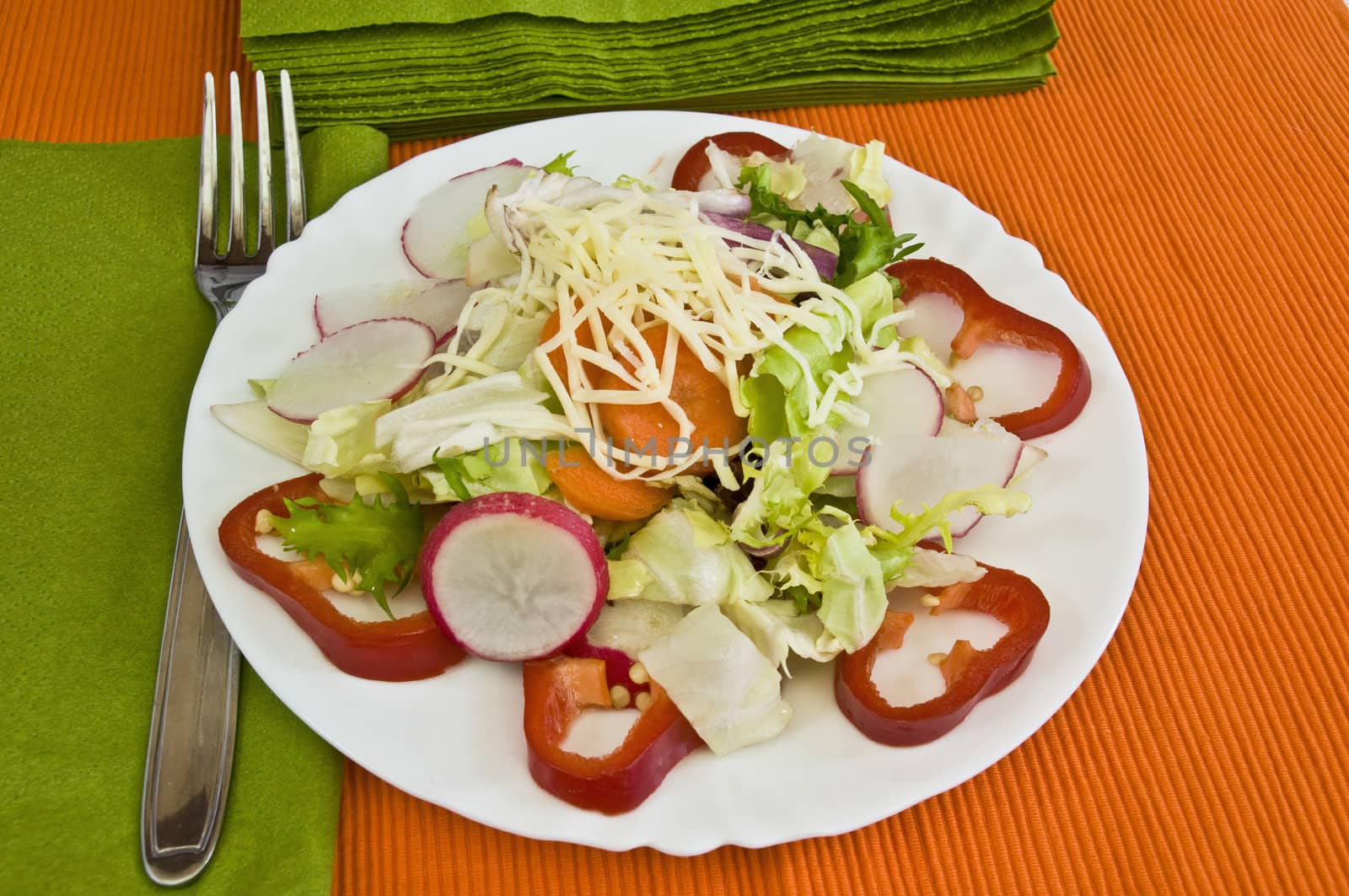 orange and green table setting, light organic salad