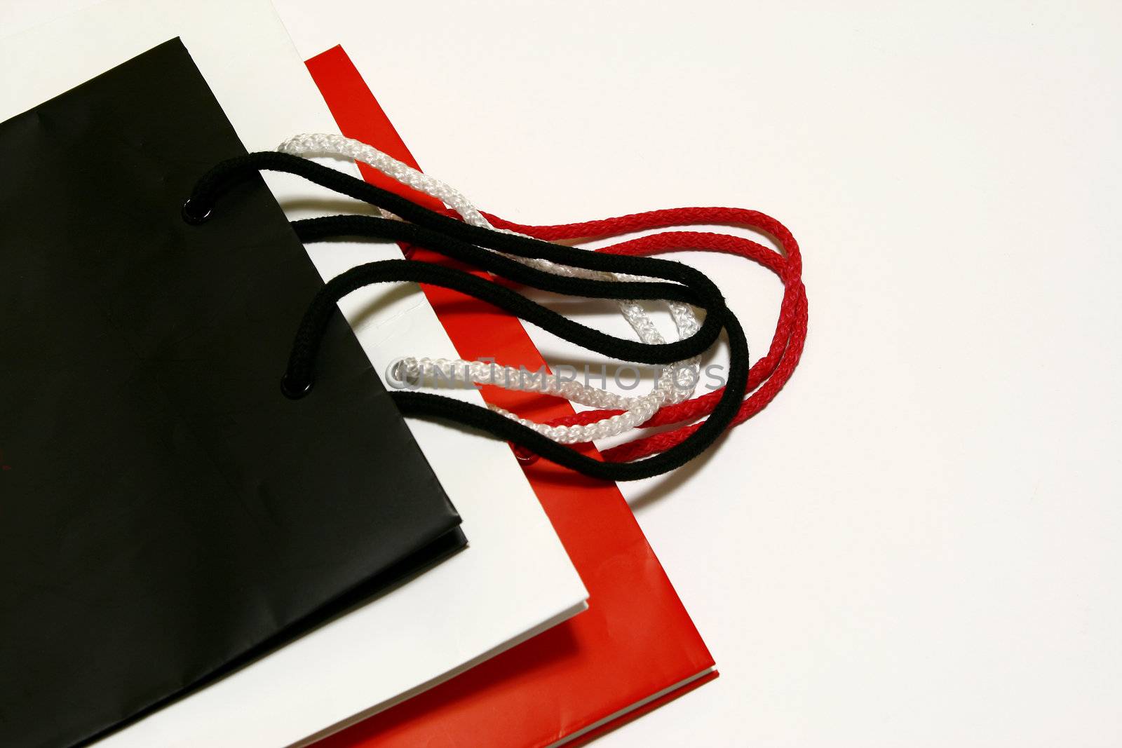 Three Shopping Bag red black white  isolated in white