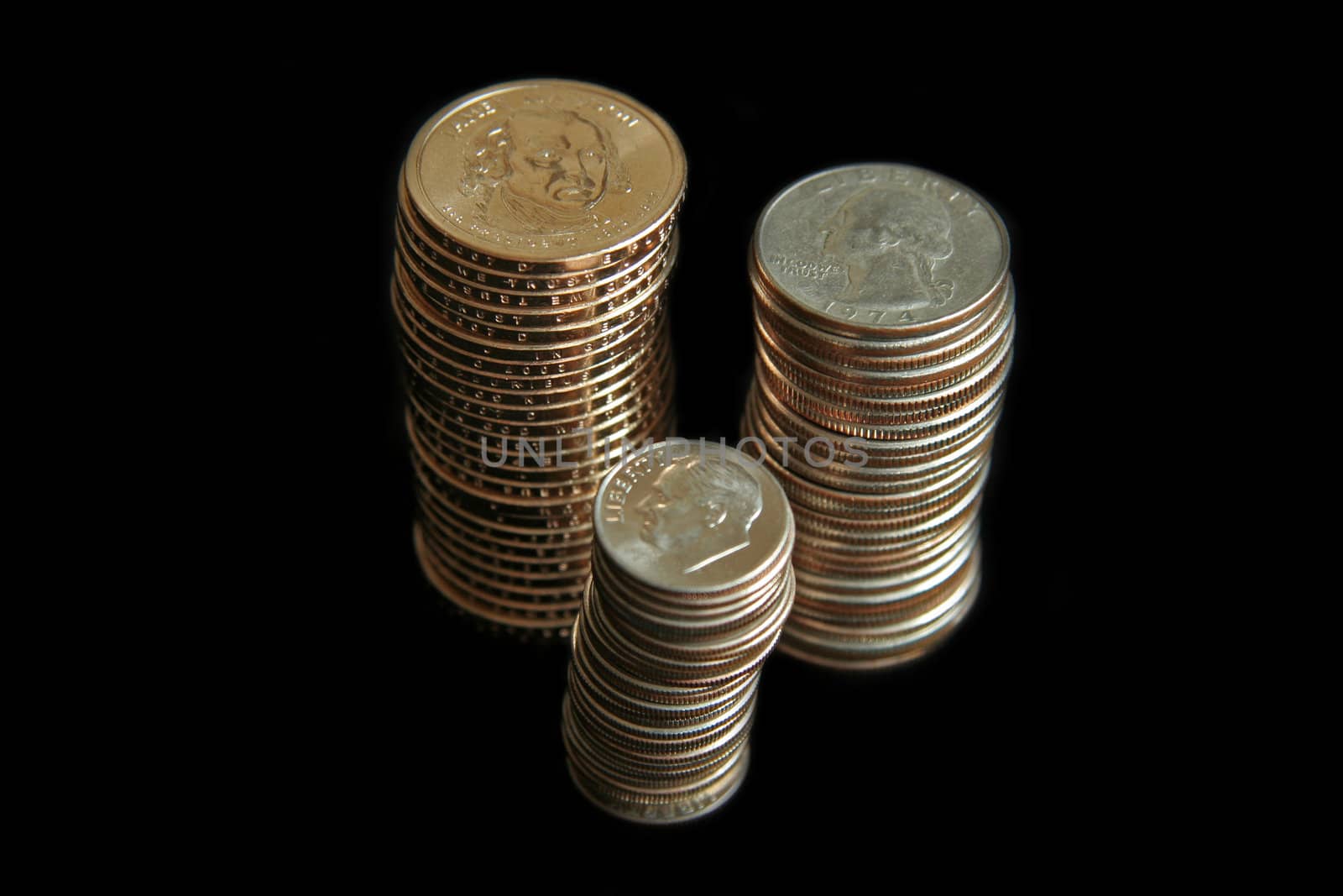 Multiple stacks of United States coins
