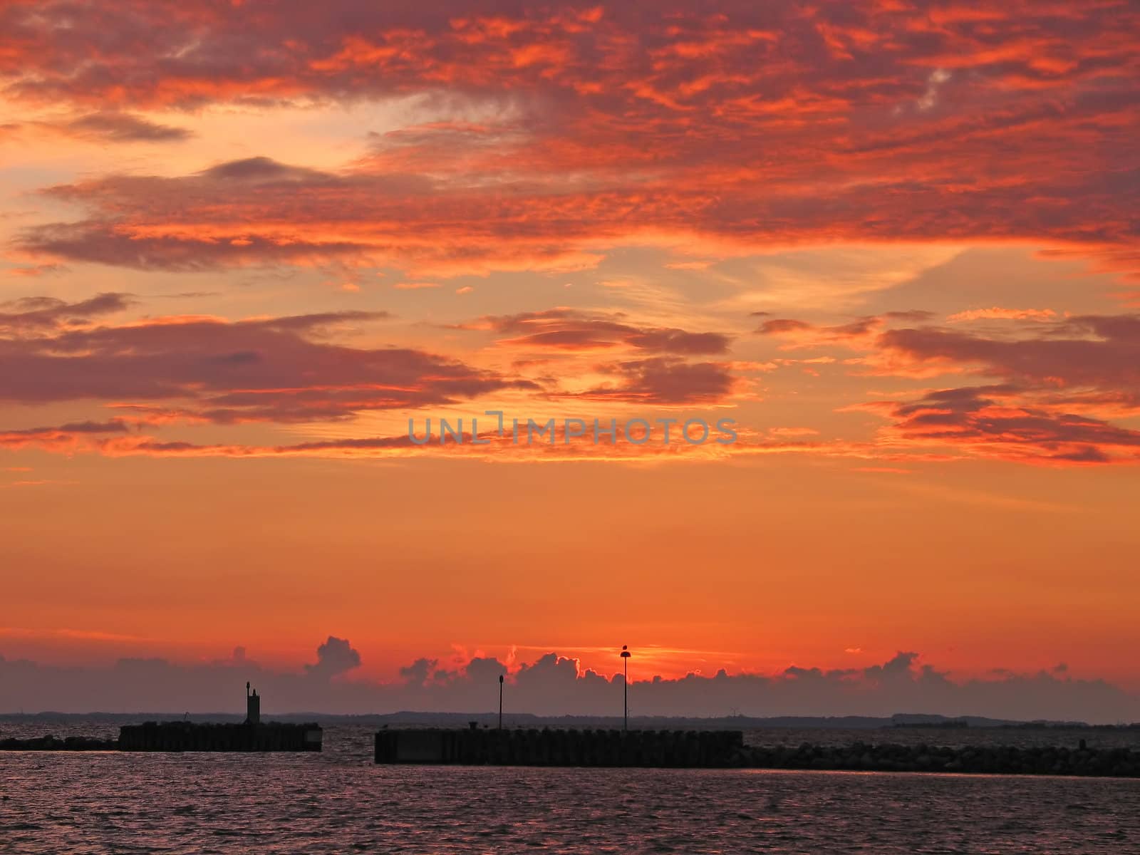 Dramatic beautiful sunset with beautiful cloudscape Assens Denmark