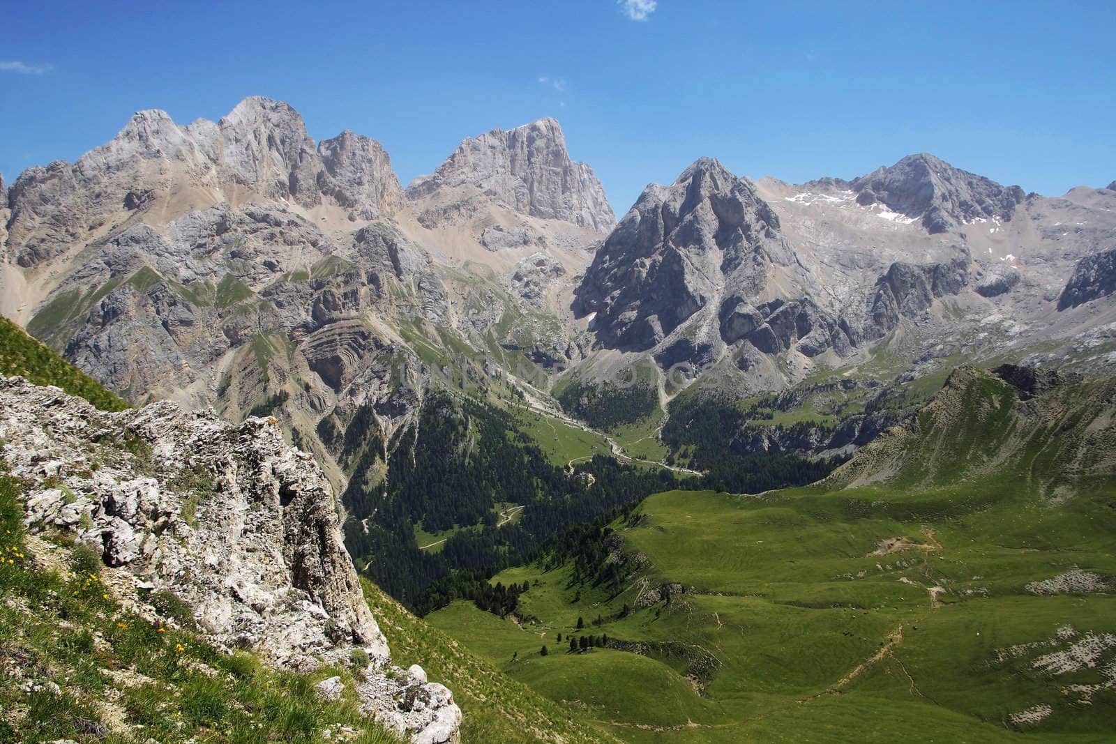 summer vief of italian dolomites with mount Marmolada on background