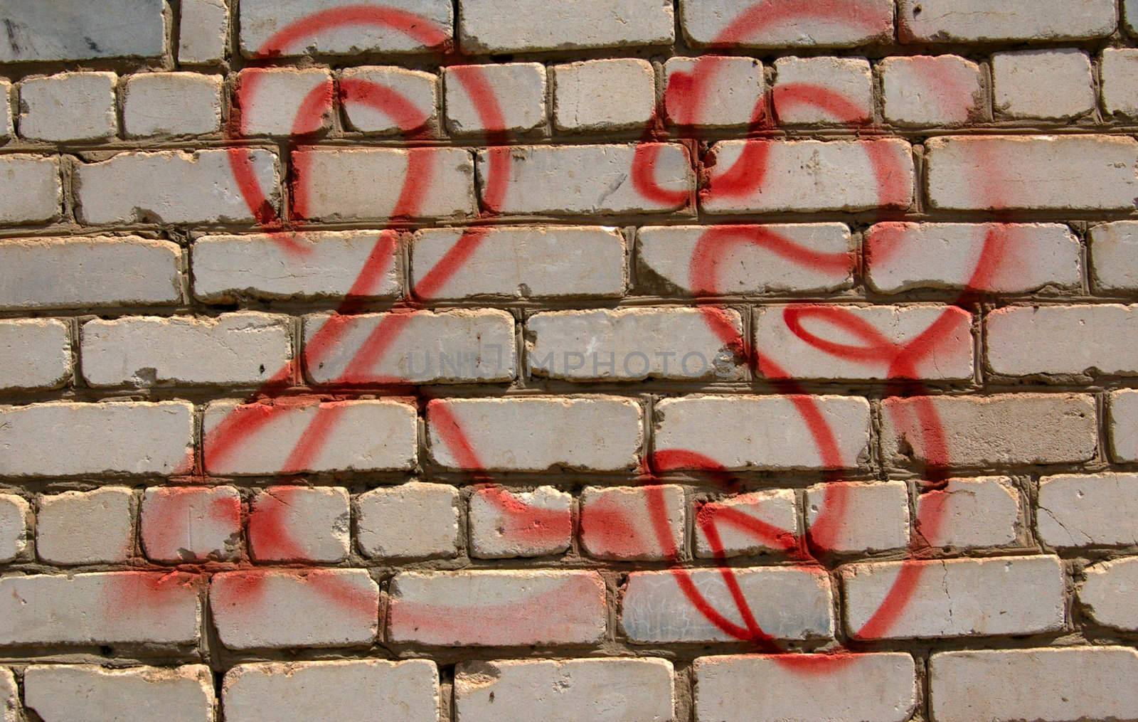 close-up of unskillful graffiti of red color - namber 23