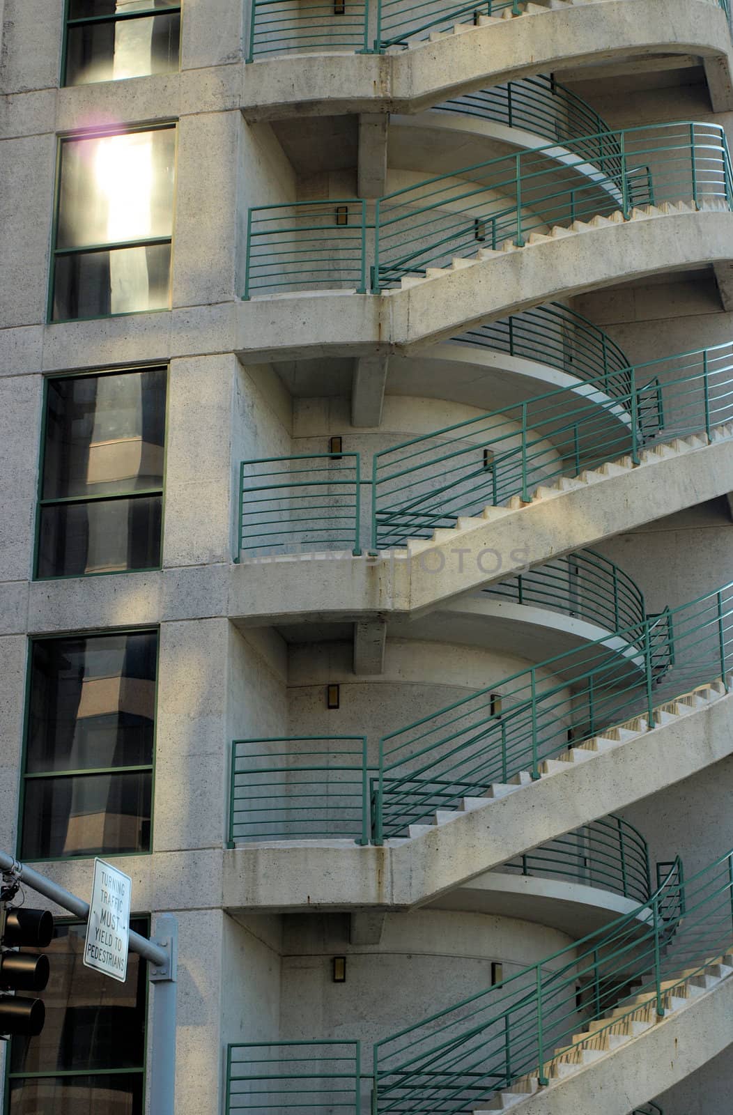 A parking deck in greensboro with stairs leading up