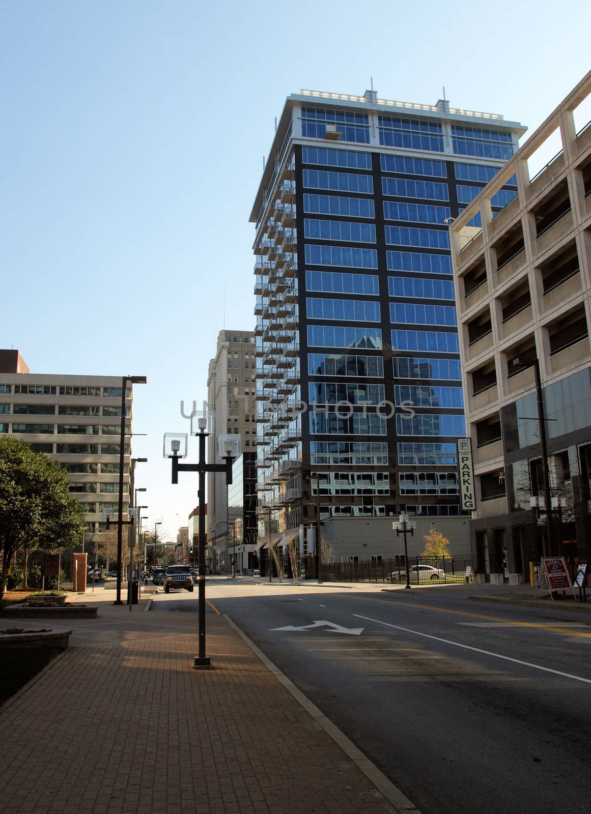 A glass building in downtown Greensboro,North Carolina. Notice the reflection on the glass.