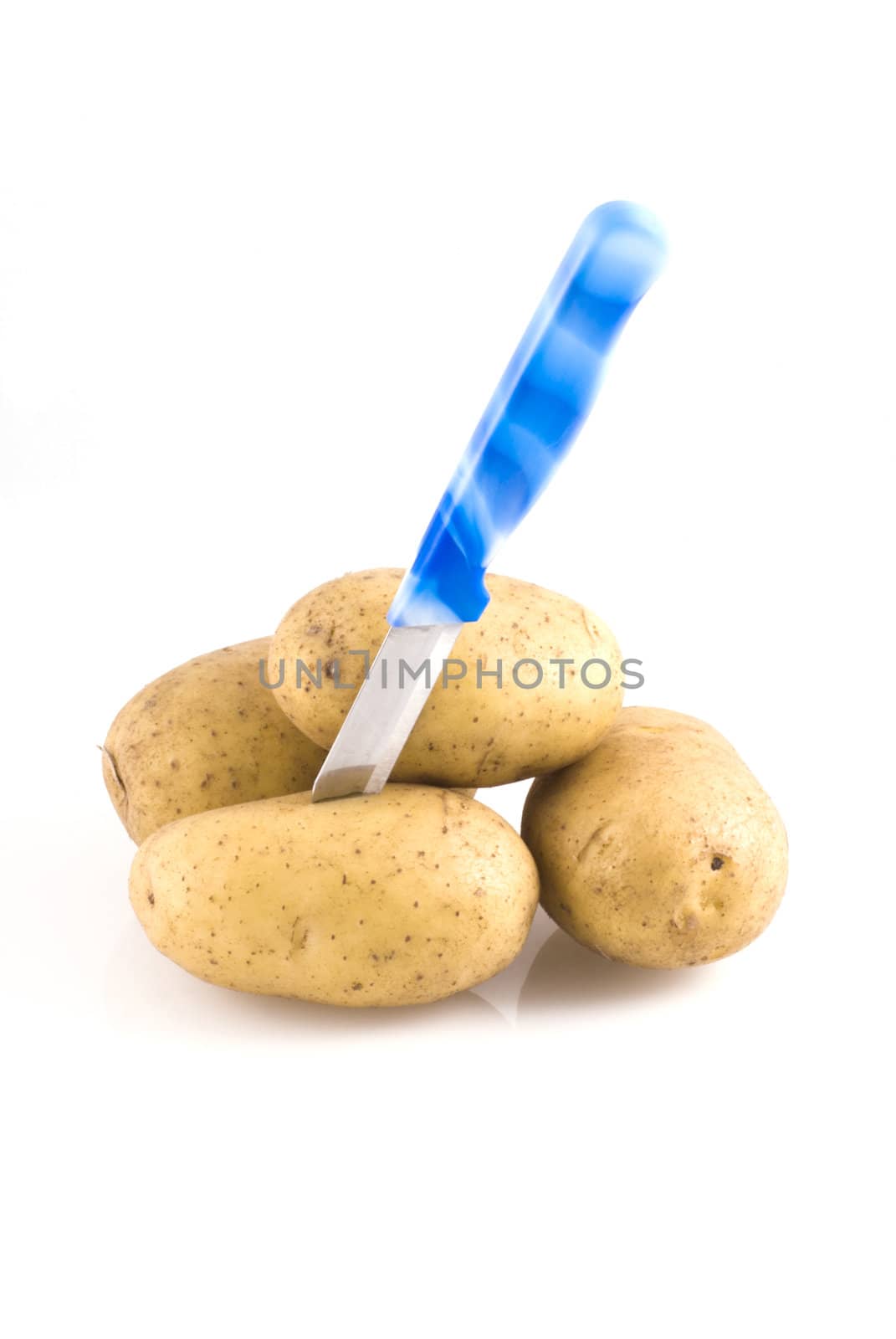 Couple of potatoes with knife isolated on white.