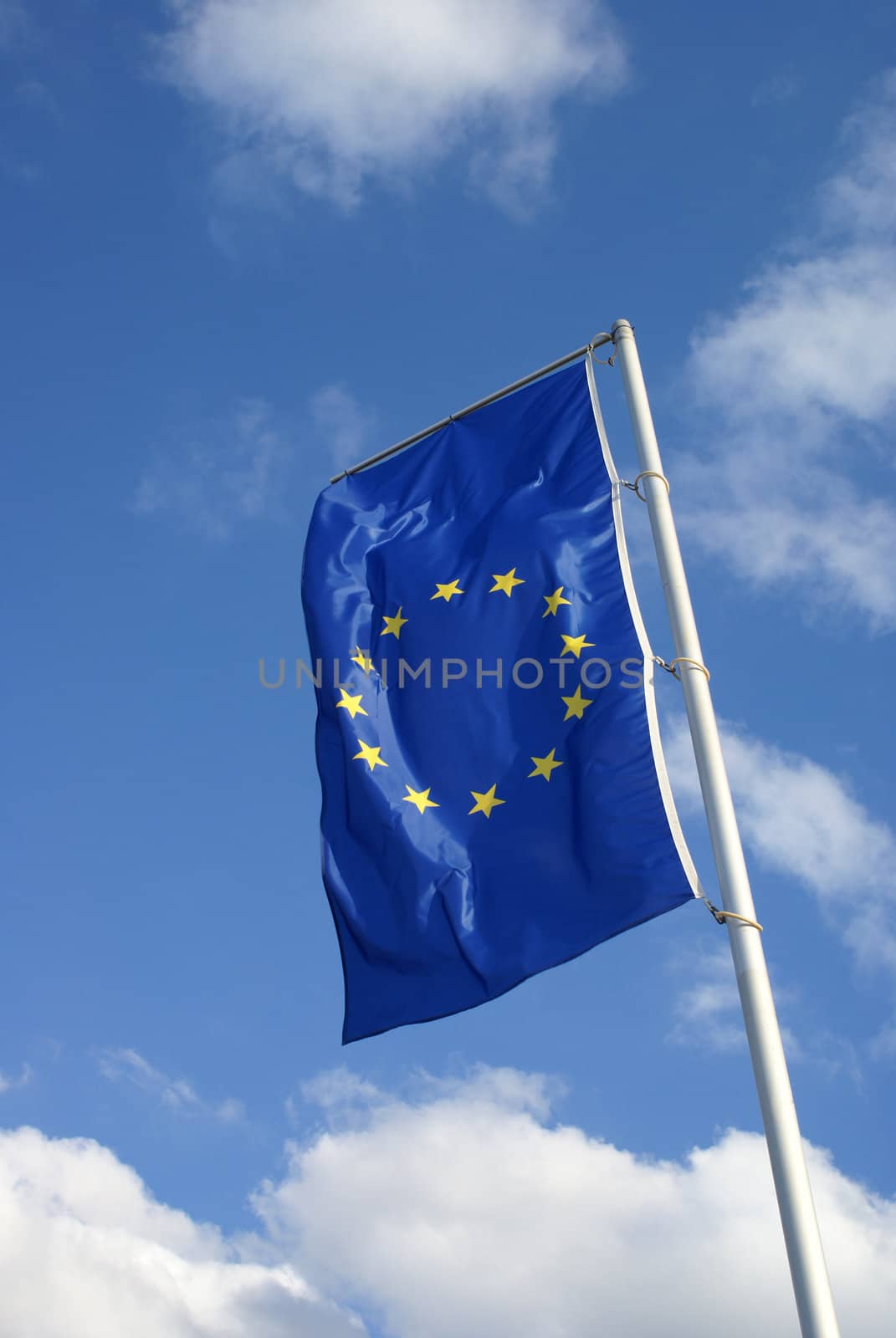 European flag against a blue sky.