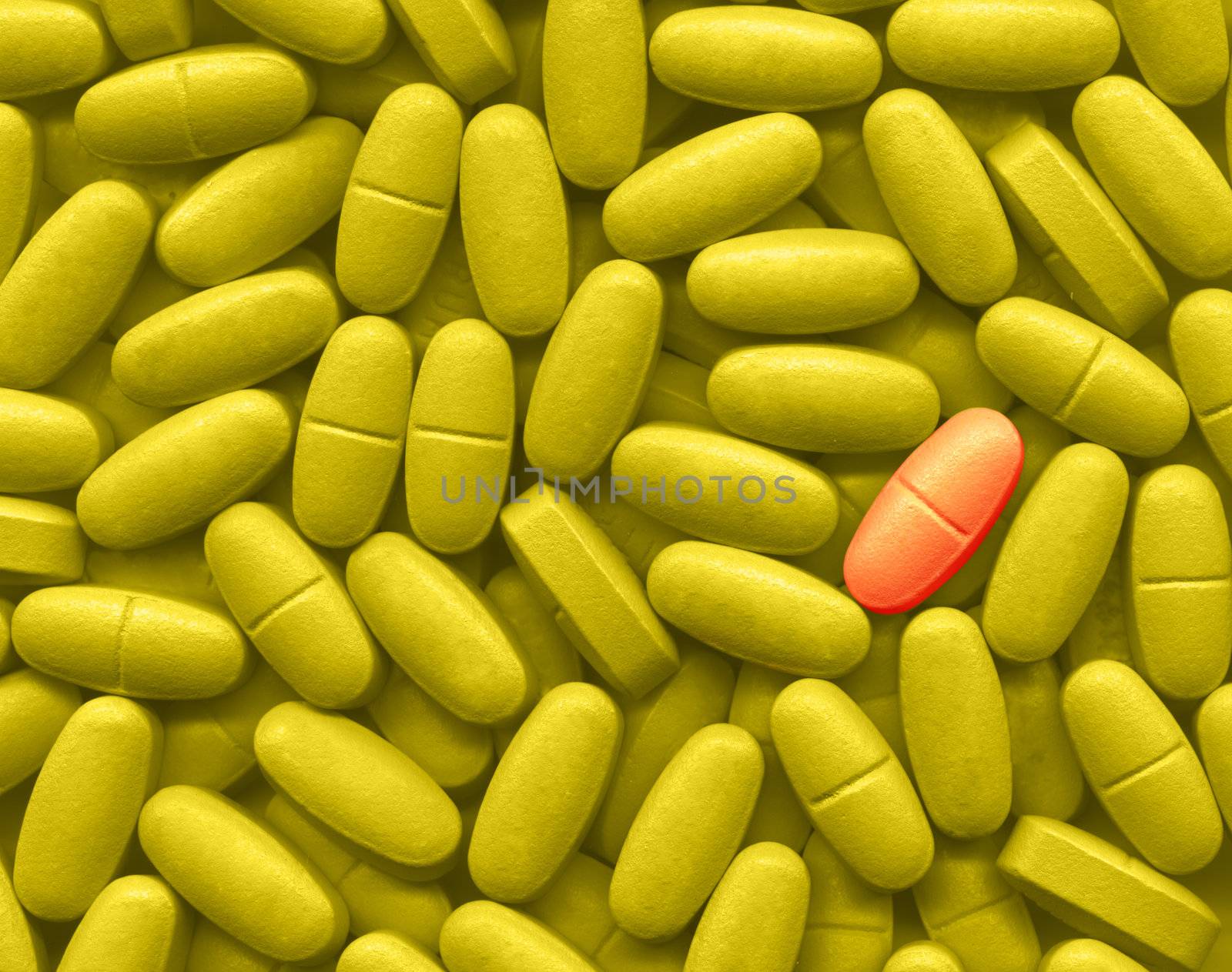A lot of yellow pills and one red