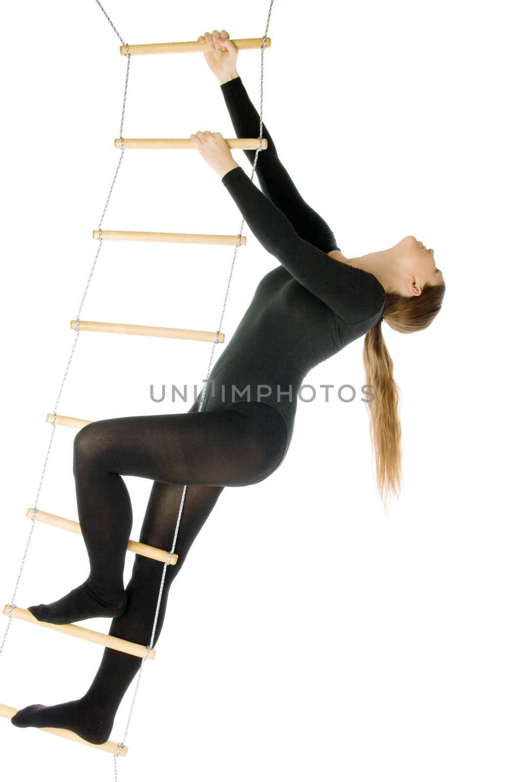 Isolated photo of a woman on a rope ladder