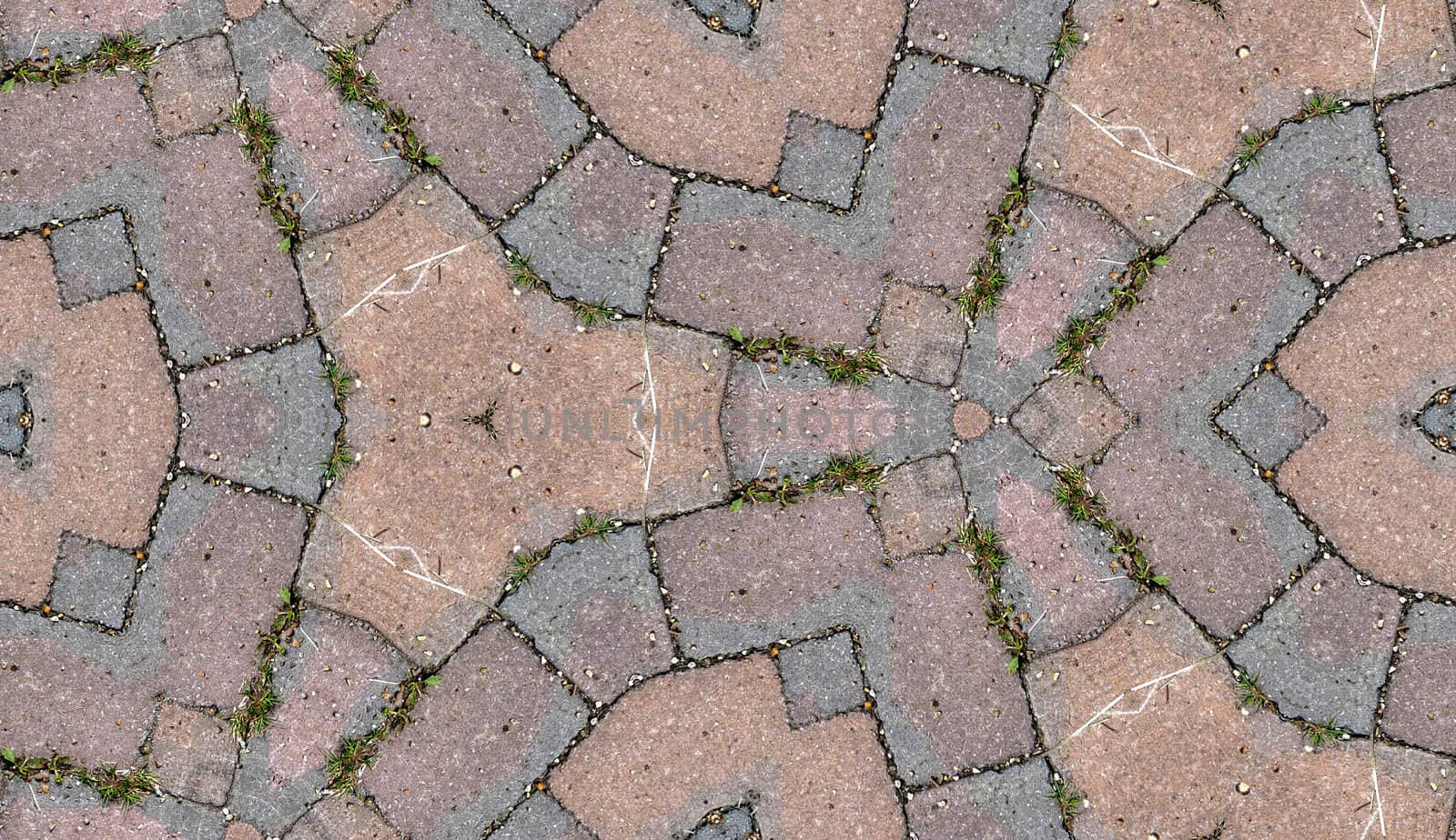 A seamless pattern background made out of stone slabs on the ground.