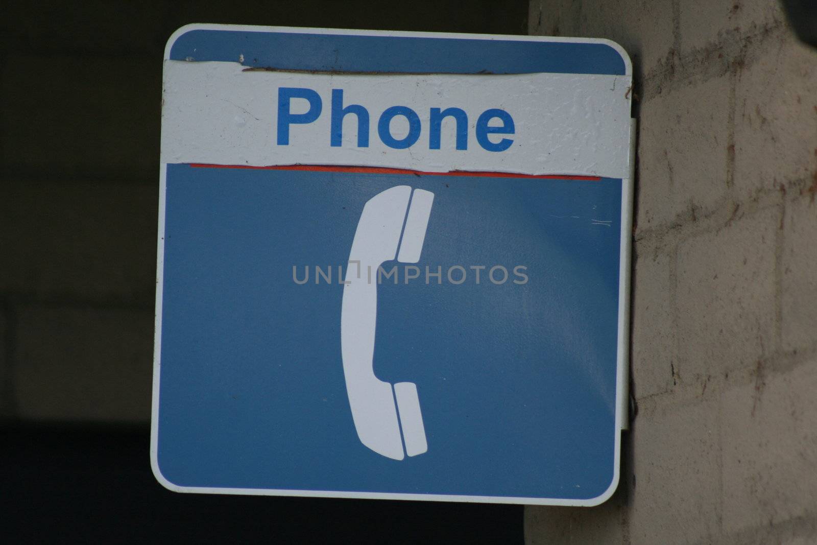 Close up of a phone booth sign.