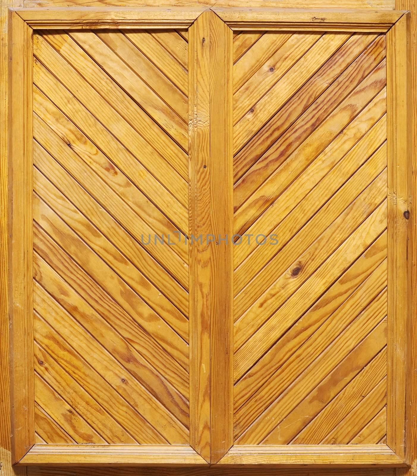 The surface of yellow wooden door