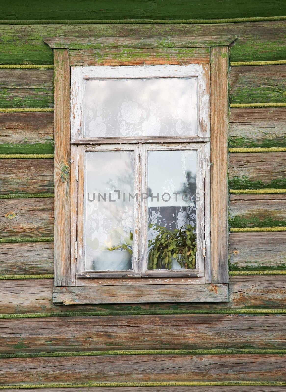 The window of old wooden rural house