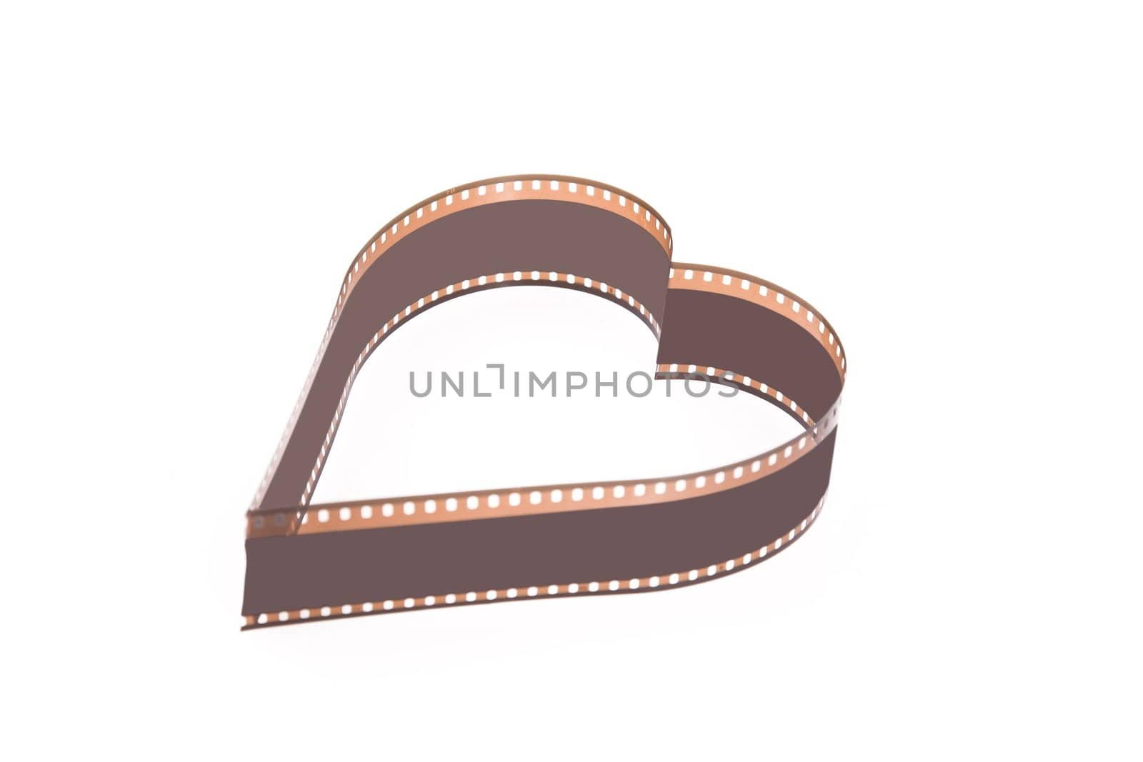 film strip in shape of heart on white background