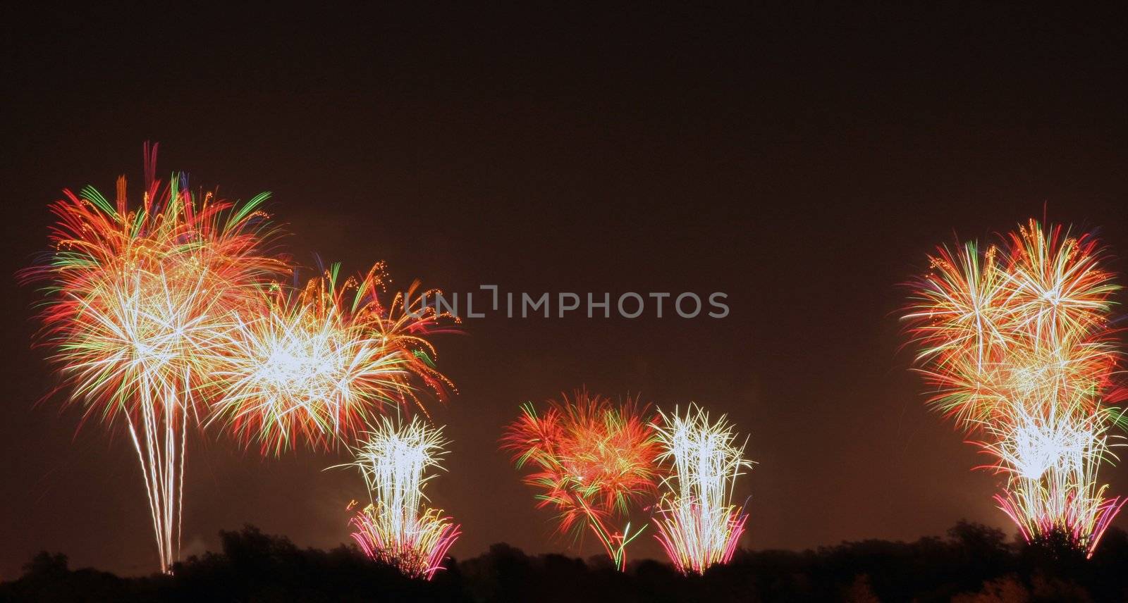 A firework display that was shot off in three locations