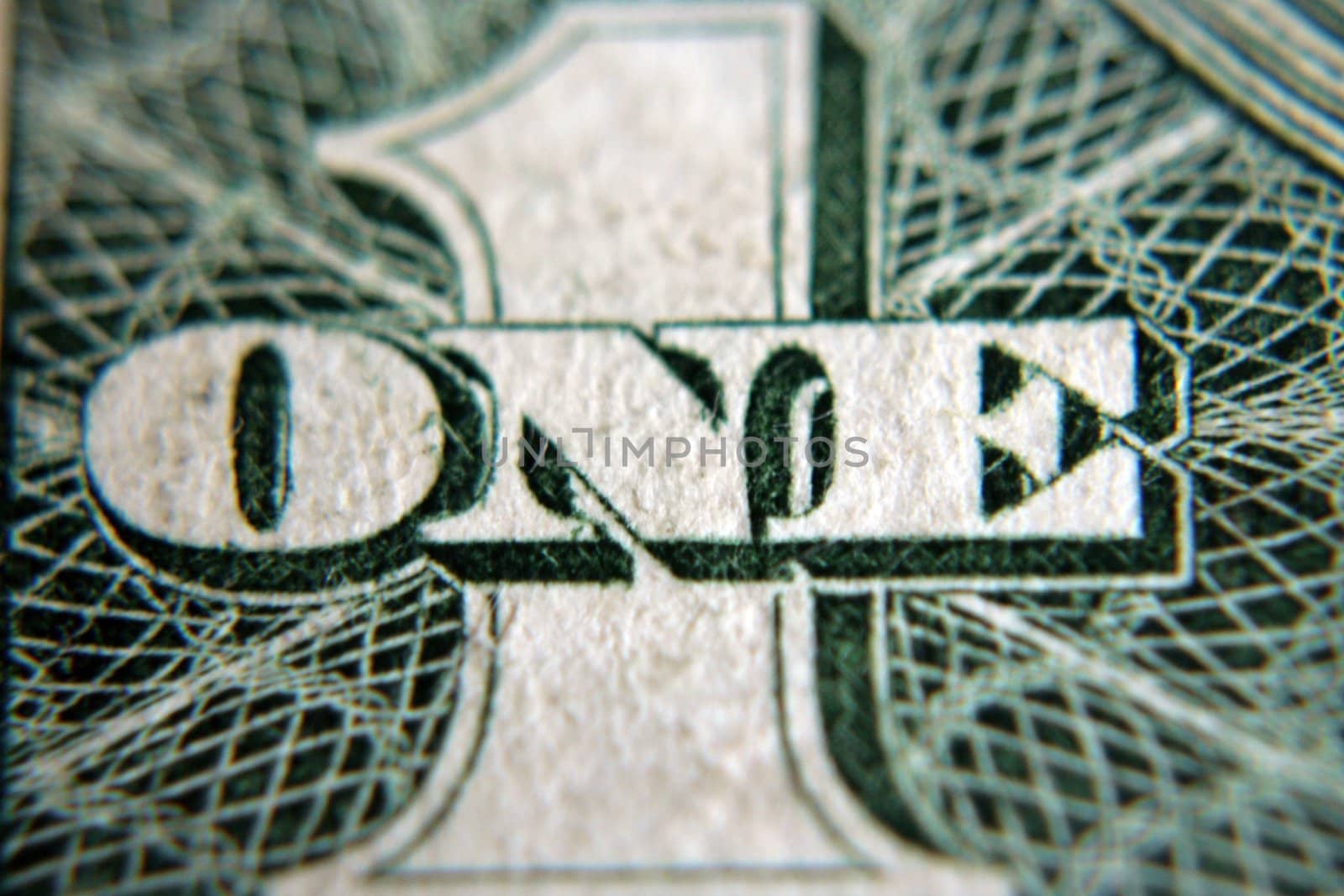 A close shot of the number five on an American one dollar bill