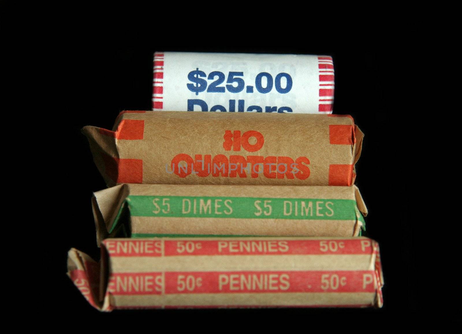 A group of rolled coins, dollars, quarters, dimes and pennies